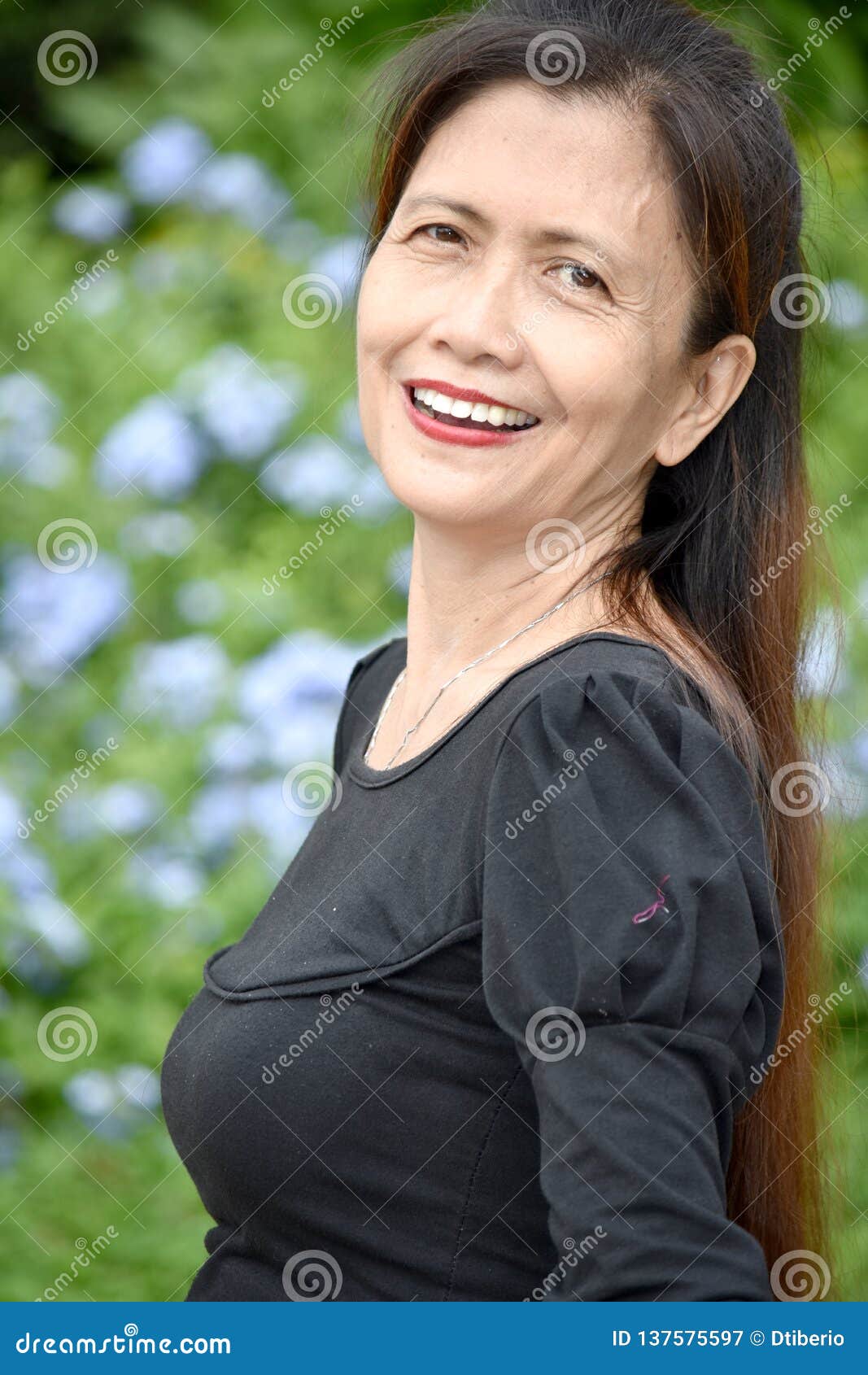 Older Filipina Female Senior And Happiness Stock Image