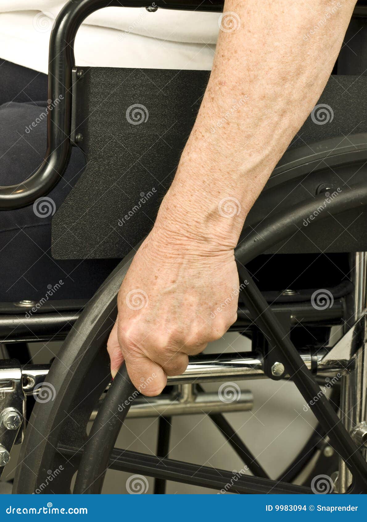 Older Hand on Wheel Chair Pushing Stock Photo Image of close, wheel