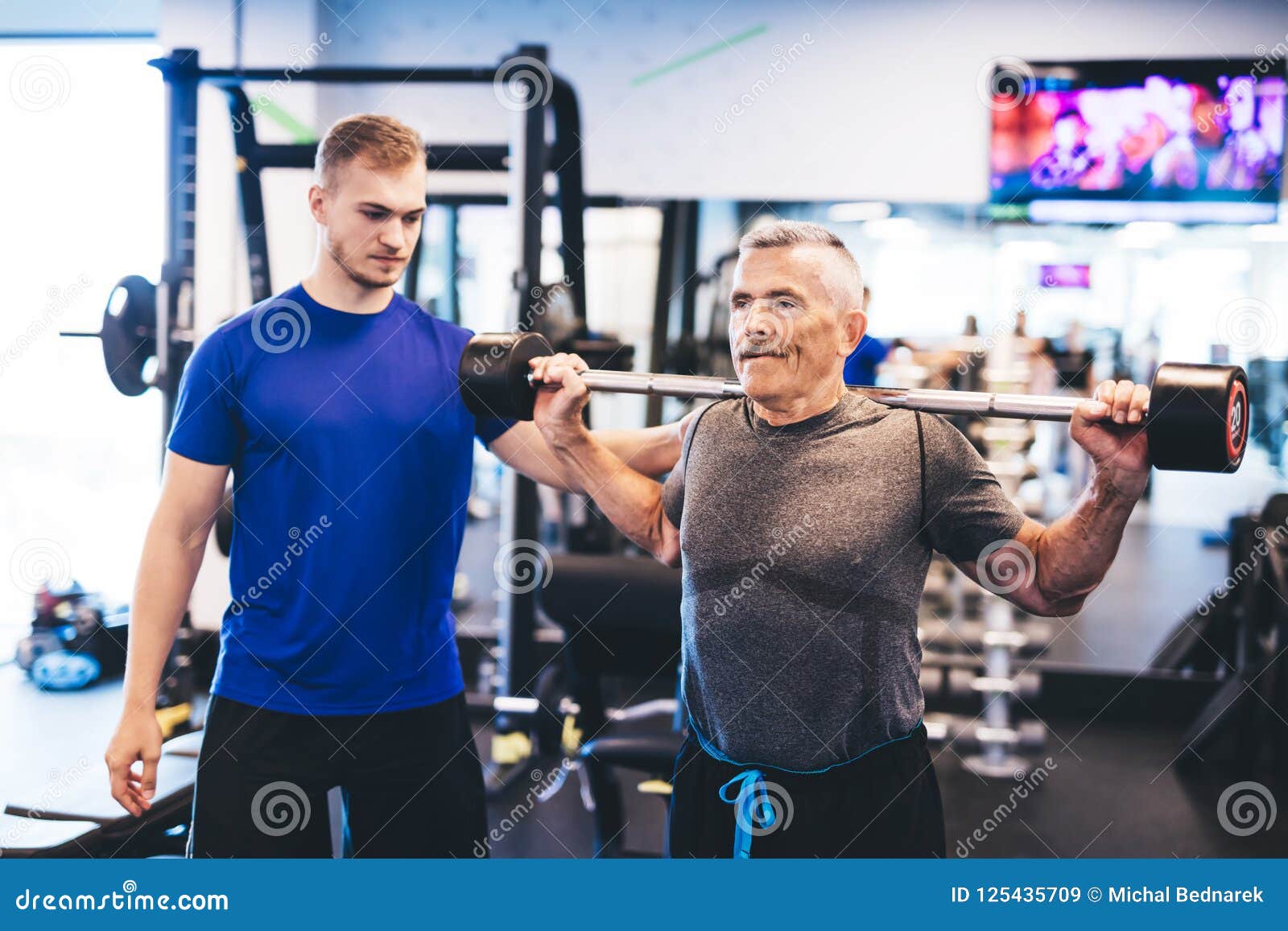 indelukke legemliggøre tyfon Older Man Assisting Senior Man at the Gym. Stock Image - Image of dumbbell,  elderly: 125435709