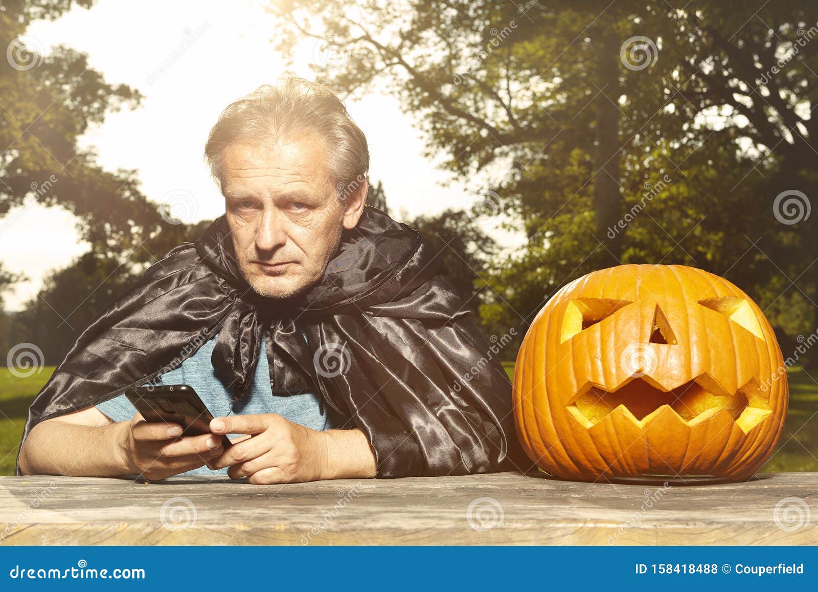 Aging Man in City Park Haunts with Pumpkin Head Stock Photo - Image of ...