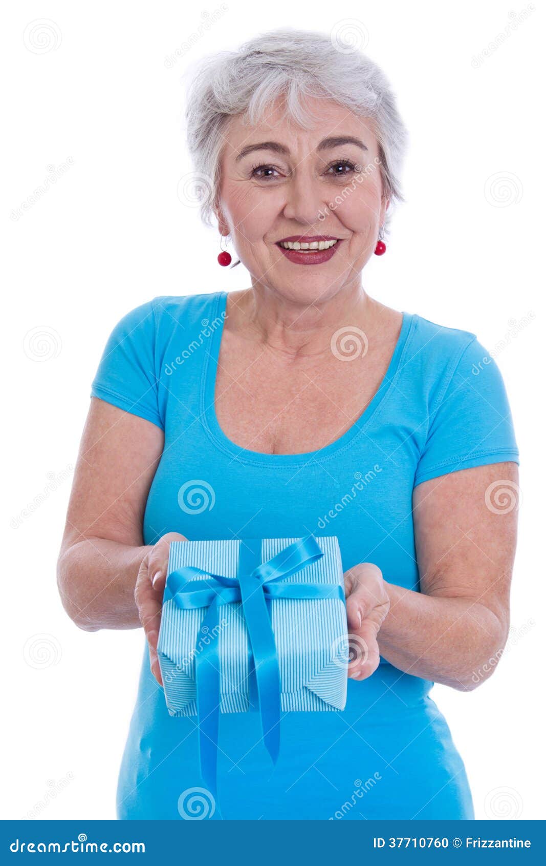 Girl in Blue T Shirt Holding Gift with Elderly Woman in White Long