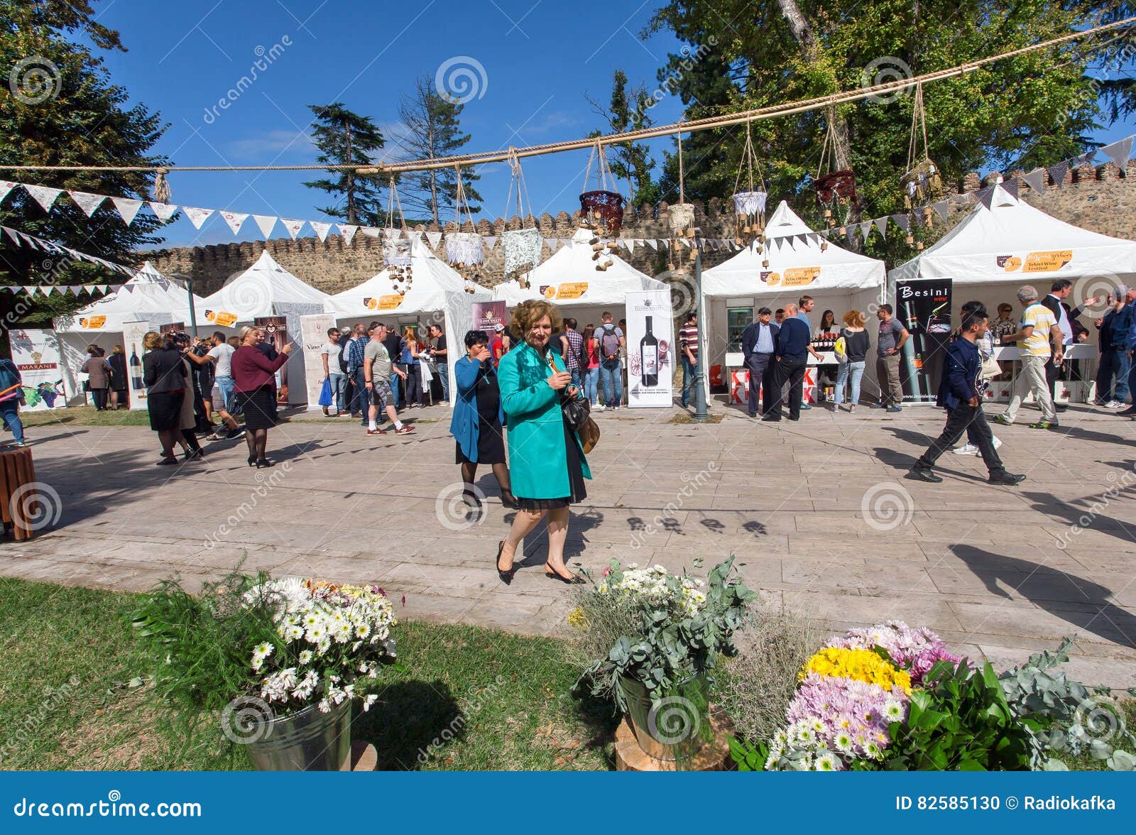 Older Women Having Fun On A City Wine Festival Telavino With Drink