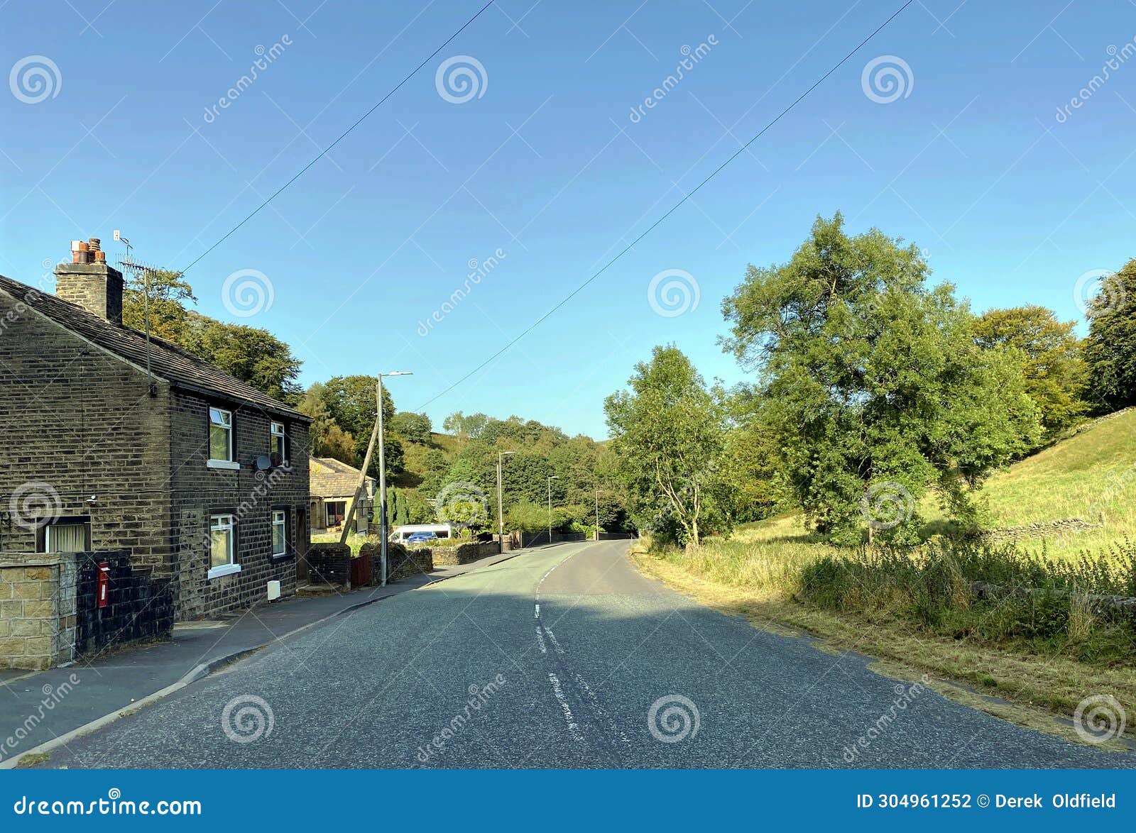Oldham Road, with a Stone Cottage, and Trees in, Ripponden, Yorkshire