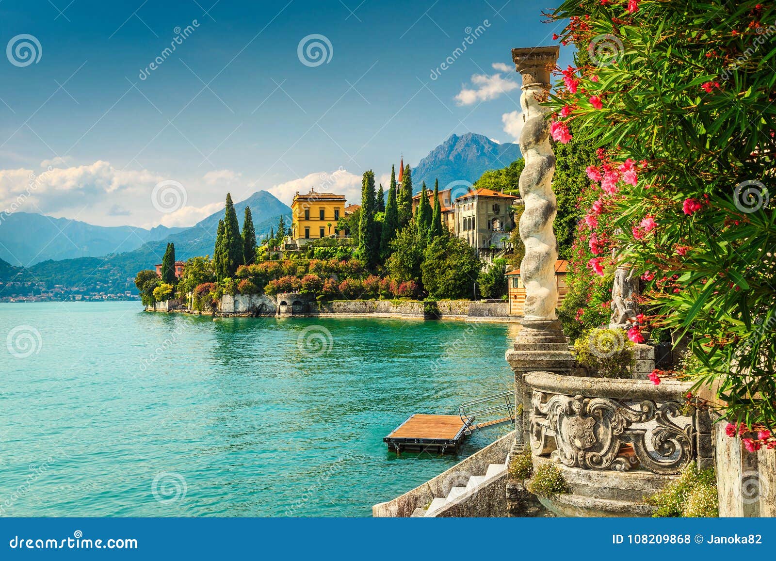 oleander flowers and villa monastero in background, lake como, varenna