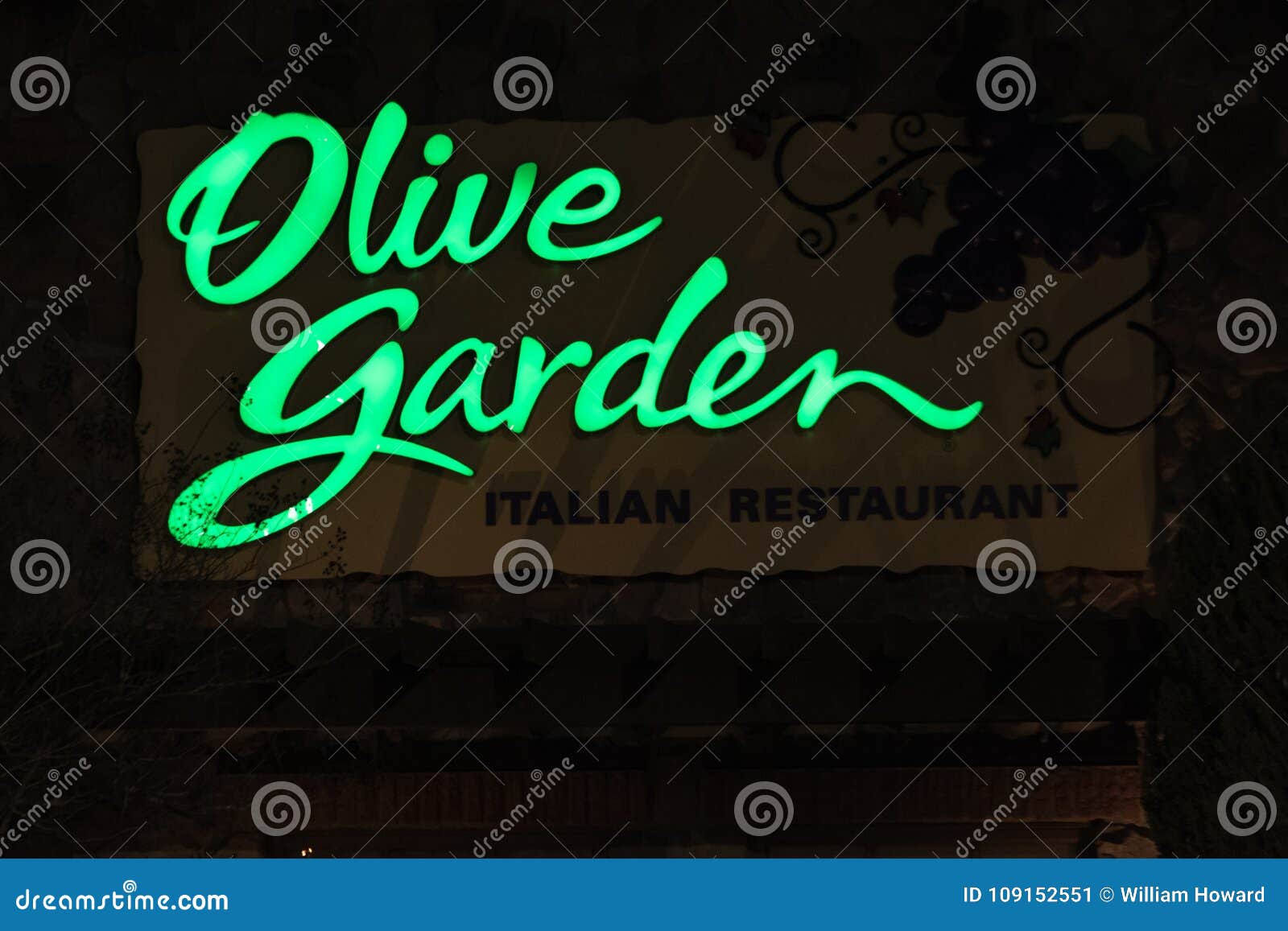 An Olive Garden Restaurant Sign Is Illuminated At Night Editorial