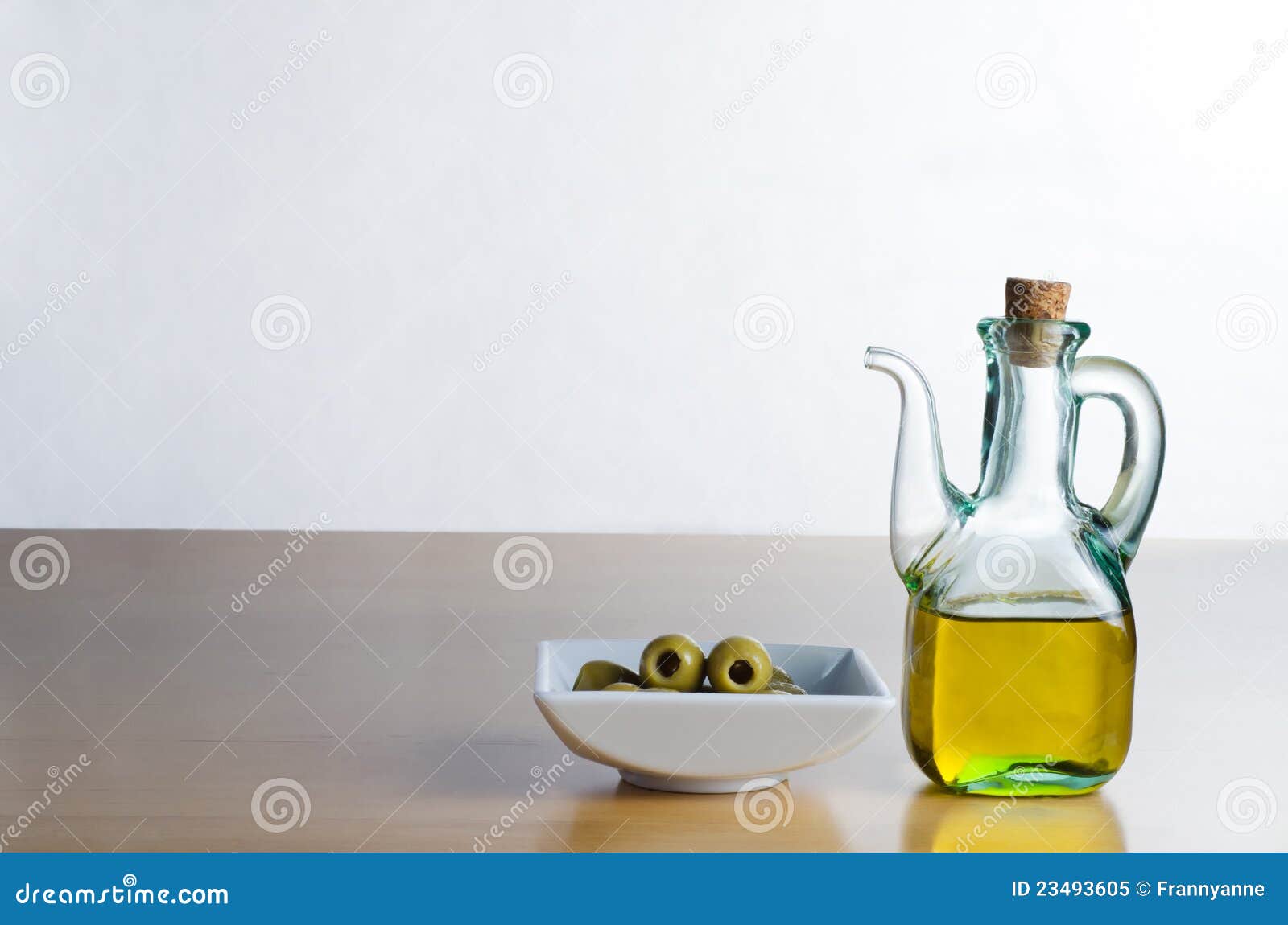 Olive Oil Jug with Olives stock image. Image of wooden 23493605