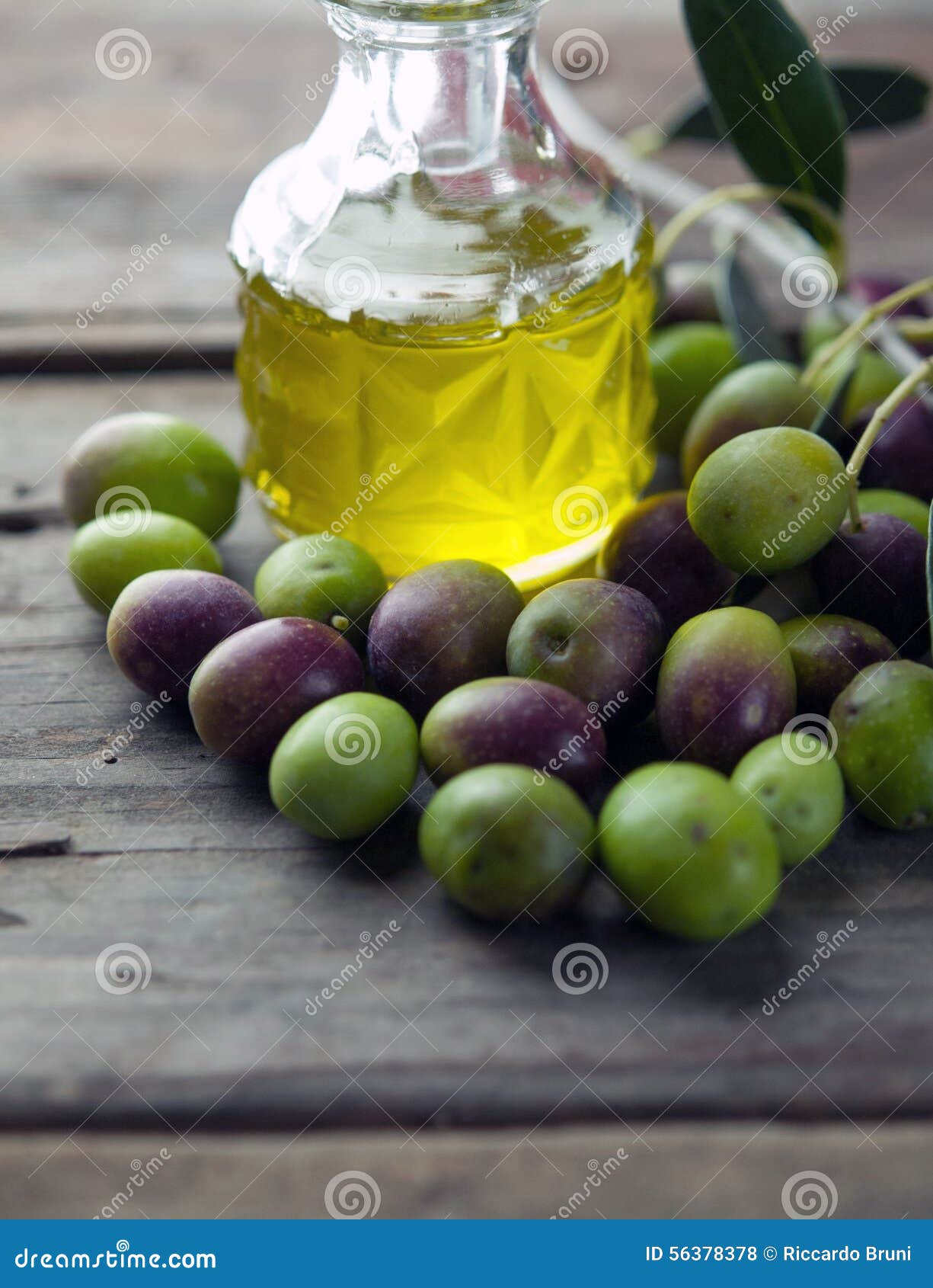 Olive oil on wooden table stock photo. Image of nature 56378378