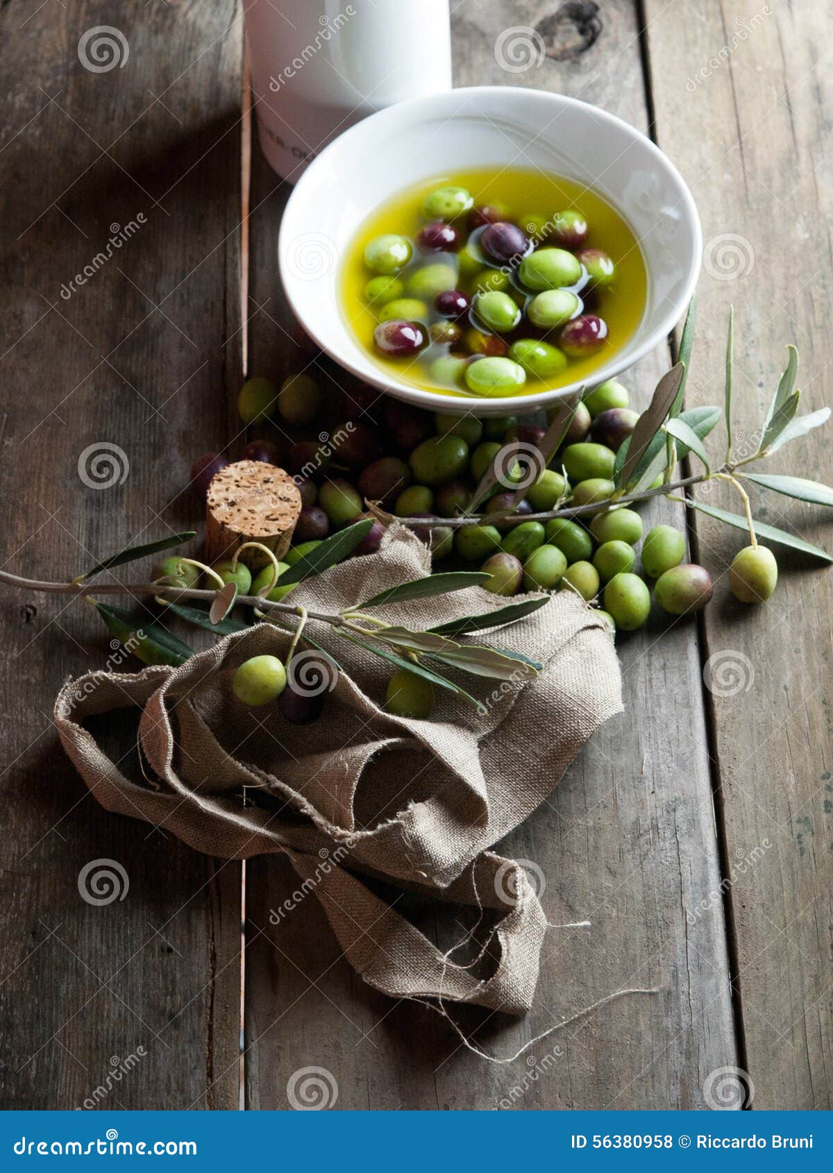 Olive oil on wooden table stock photo. Image of healthy 56380958