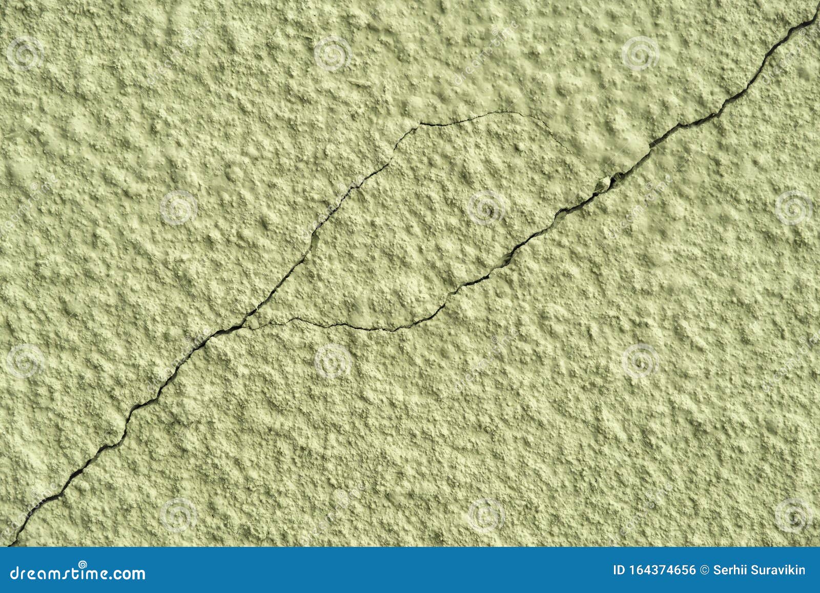 Chipped Plaster On The Wall. Traces Of Paint And Stains, There Are