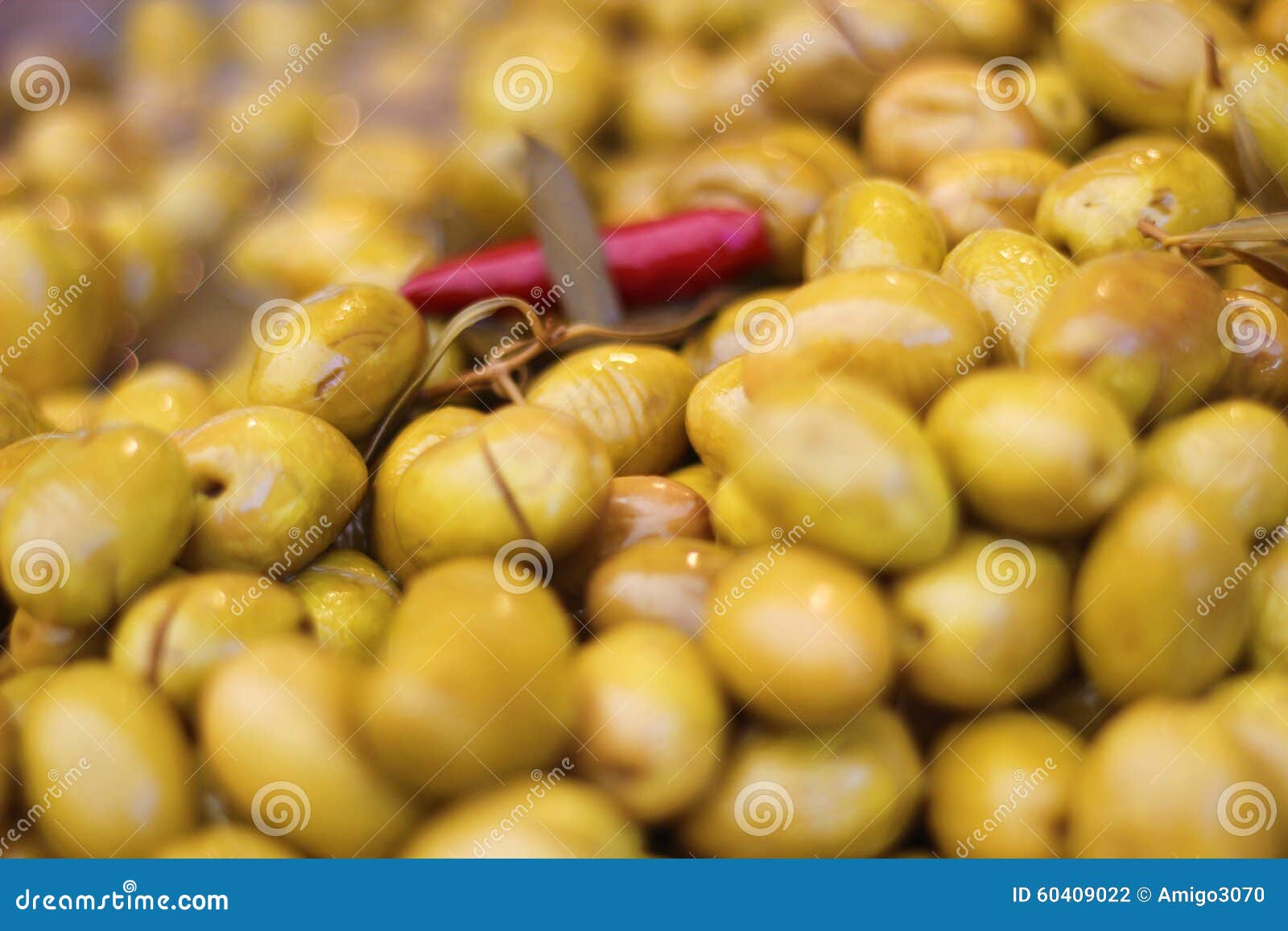 Mixed olives, thyme, rosemary, lemon juice and zest, red pepper slices thinly sliced garlic, olive oil and black pepper.