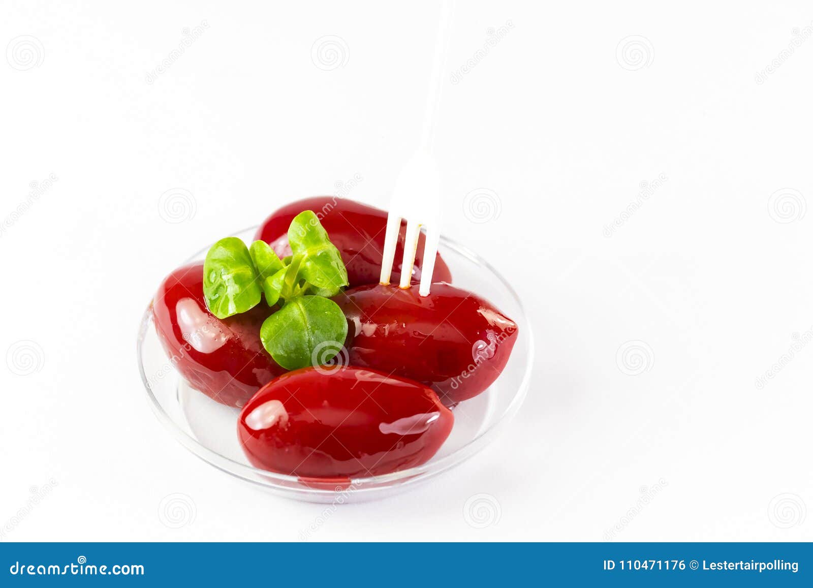 olives in a small plastic plate