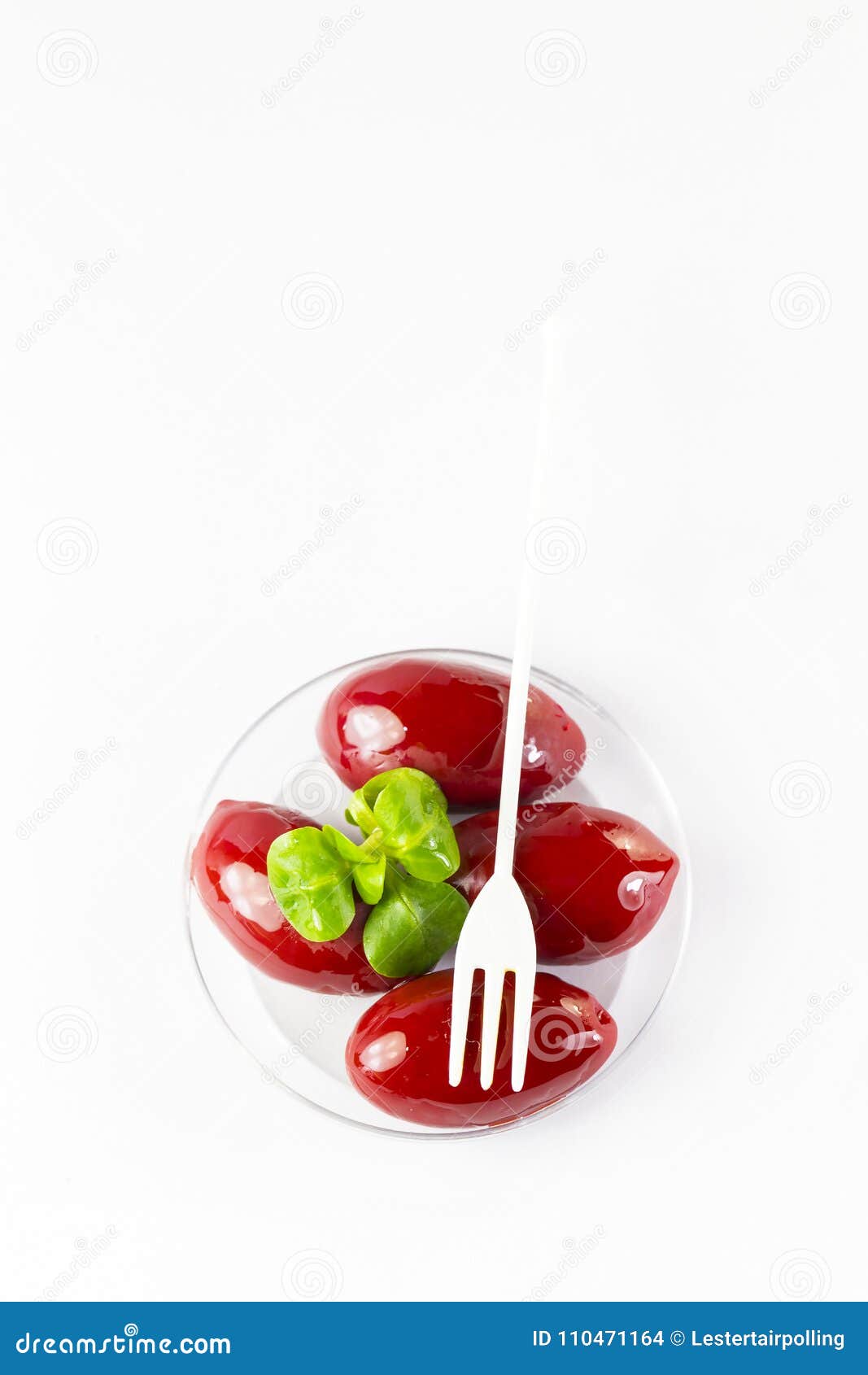 olives in a small plastic plate