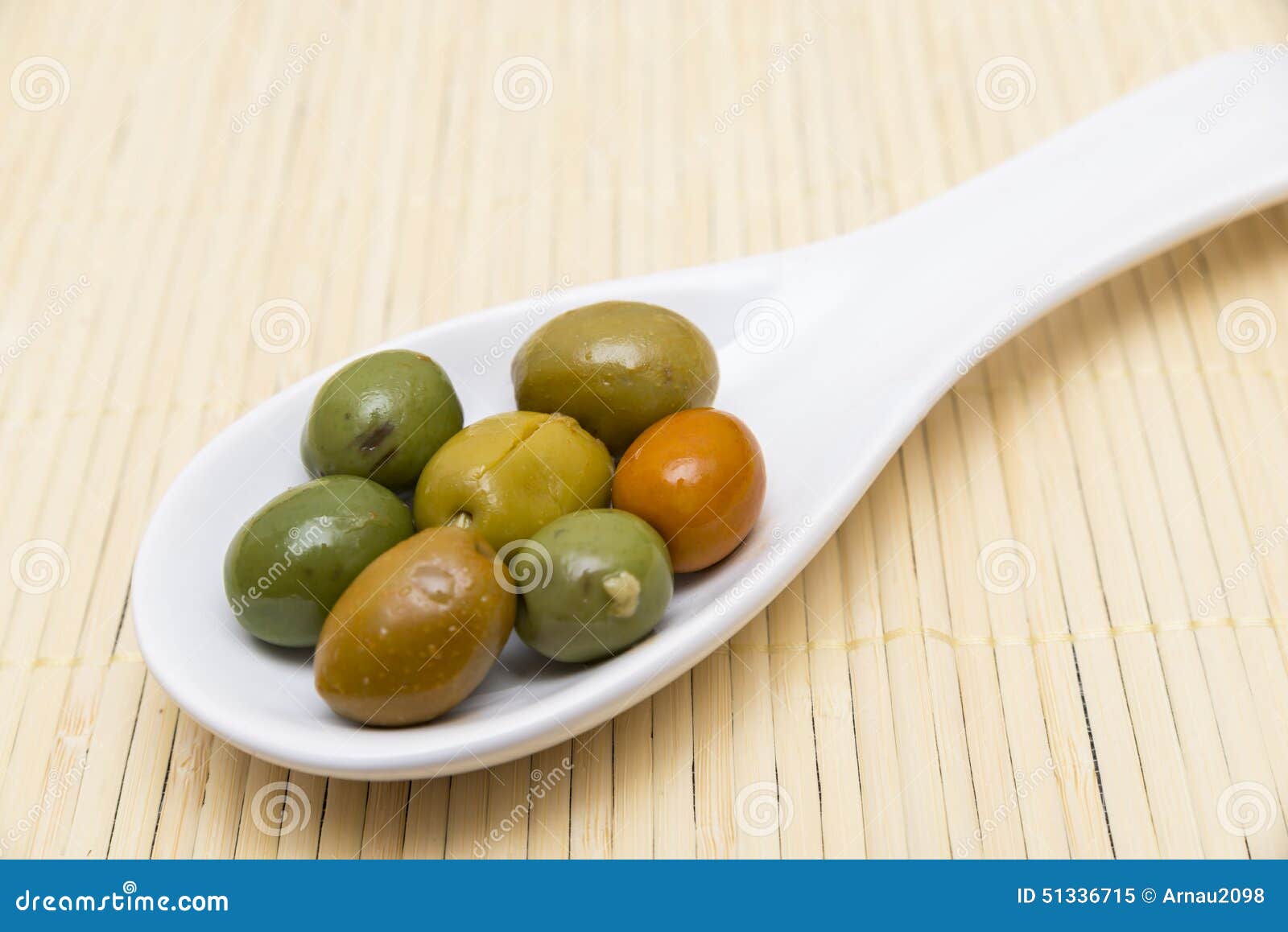 Olives in a spoon stock image. Image of maturation, background 51336715