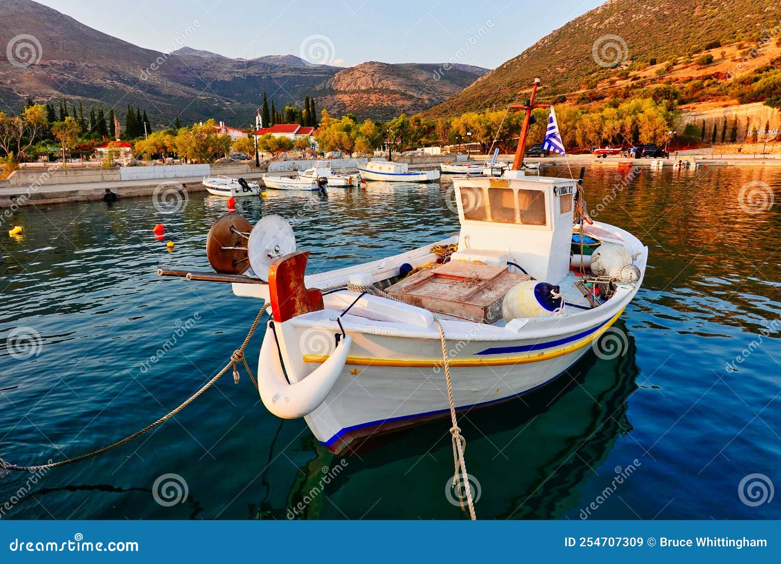 Old Small Wooden Caique Fishing Boat in Village Harbour, Greece Stock ...