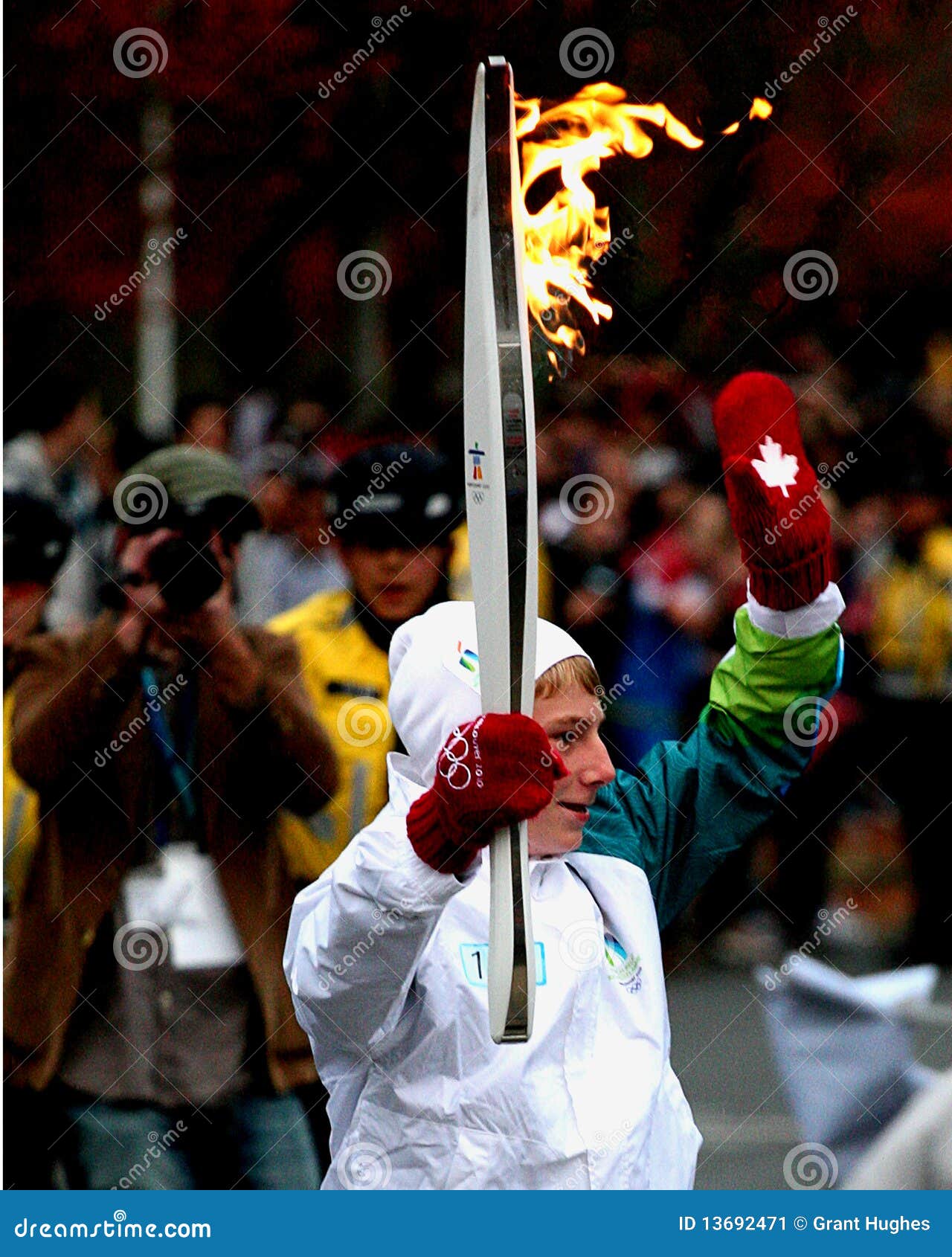 Olympic Torch Bearer Waves To Crowd Editorial Photo Image of olympics