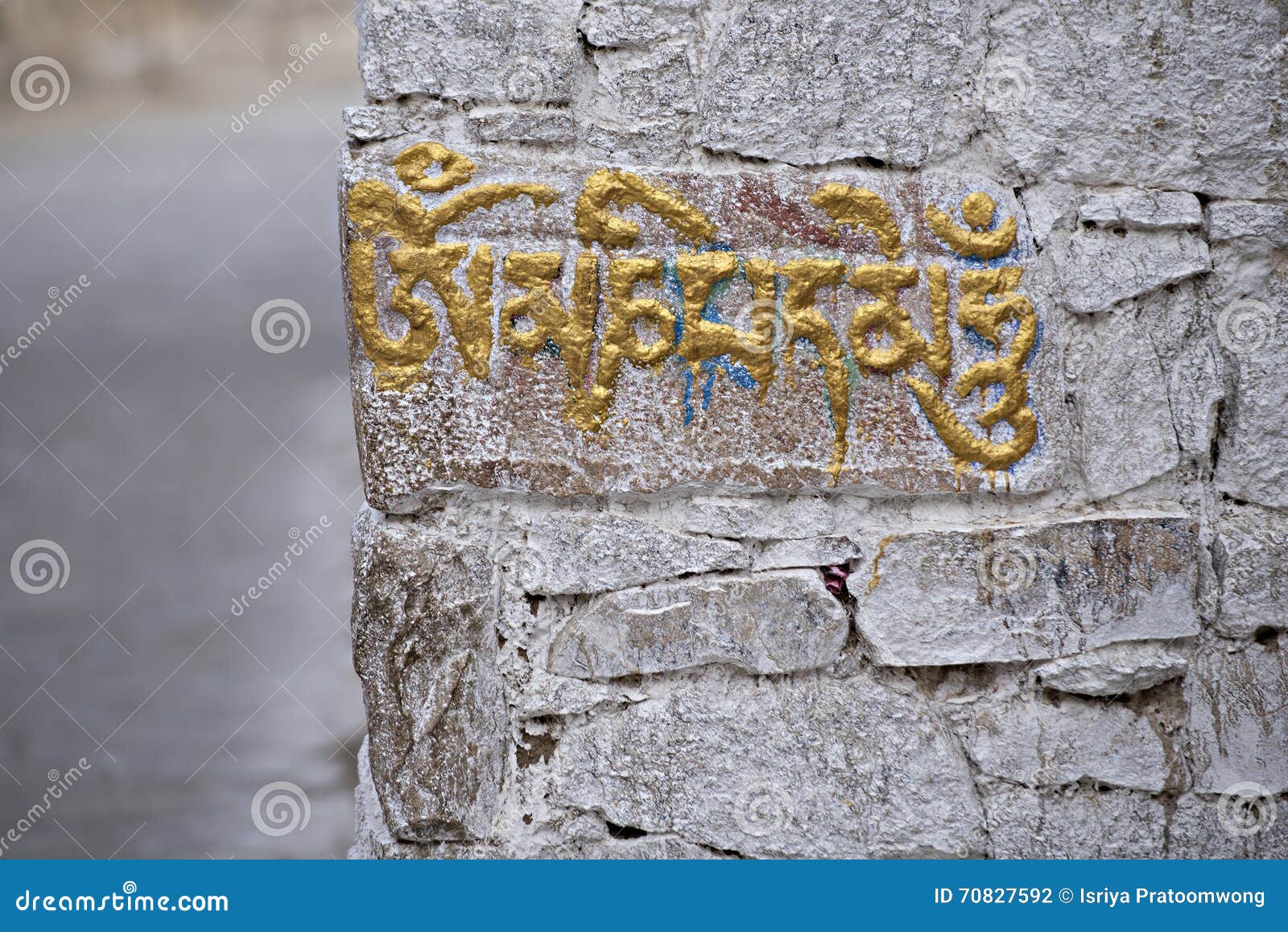 â€œOm Mani Padme Humâ€, six-syllabled mantra, written in Tibetan alphabet on the wall of one monastery