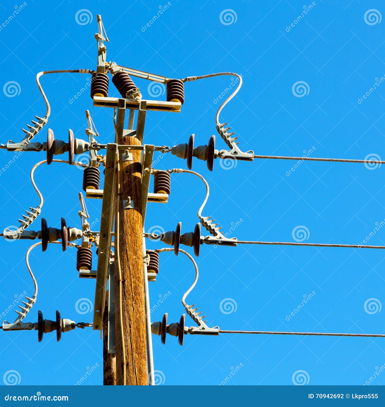 In Oman the Electric Cable Wood Pylon Energy and Current Line Stock