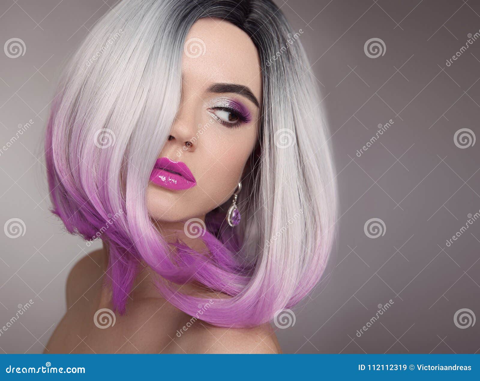 ombre bob blonde short hairstyle. purple makeup. beautiful hair