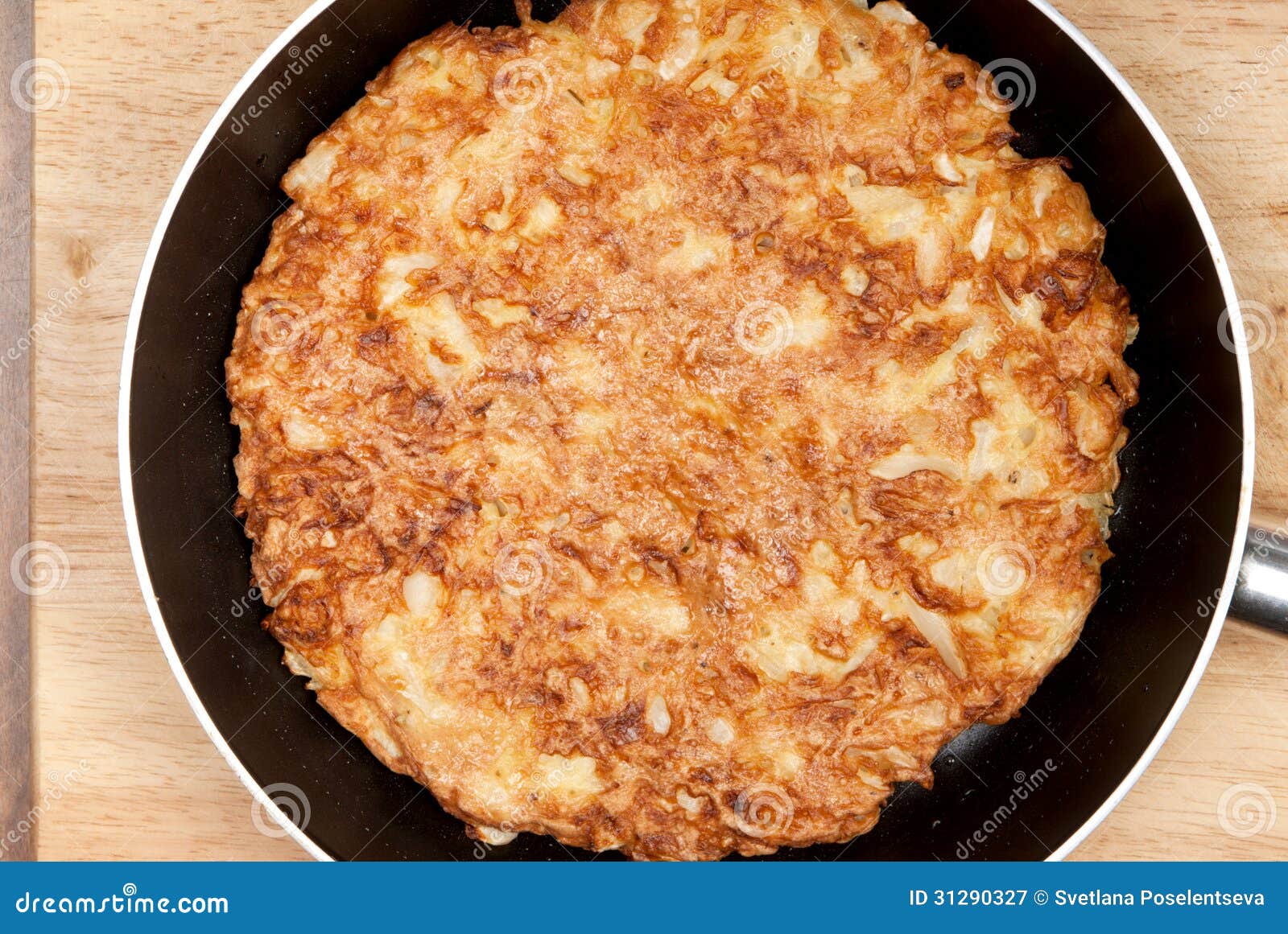 Omelet in a frying pan stock image. Image of eating, frying 31290327