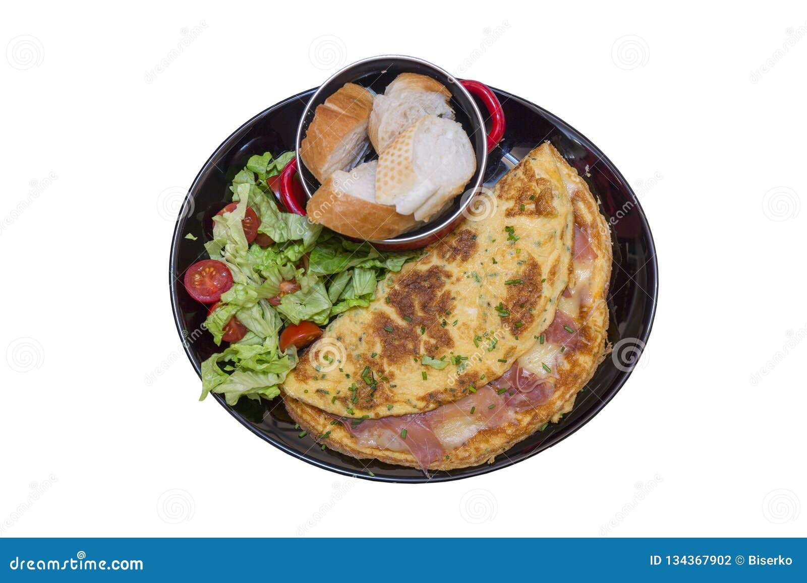 Omelett med skinka och grönsaker på sida