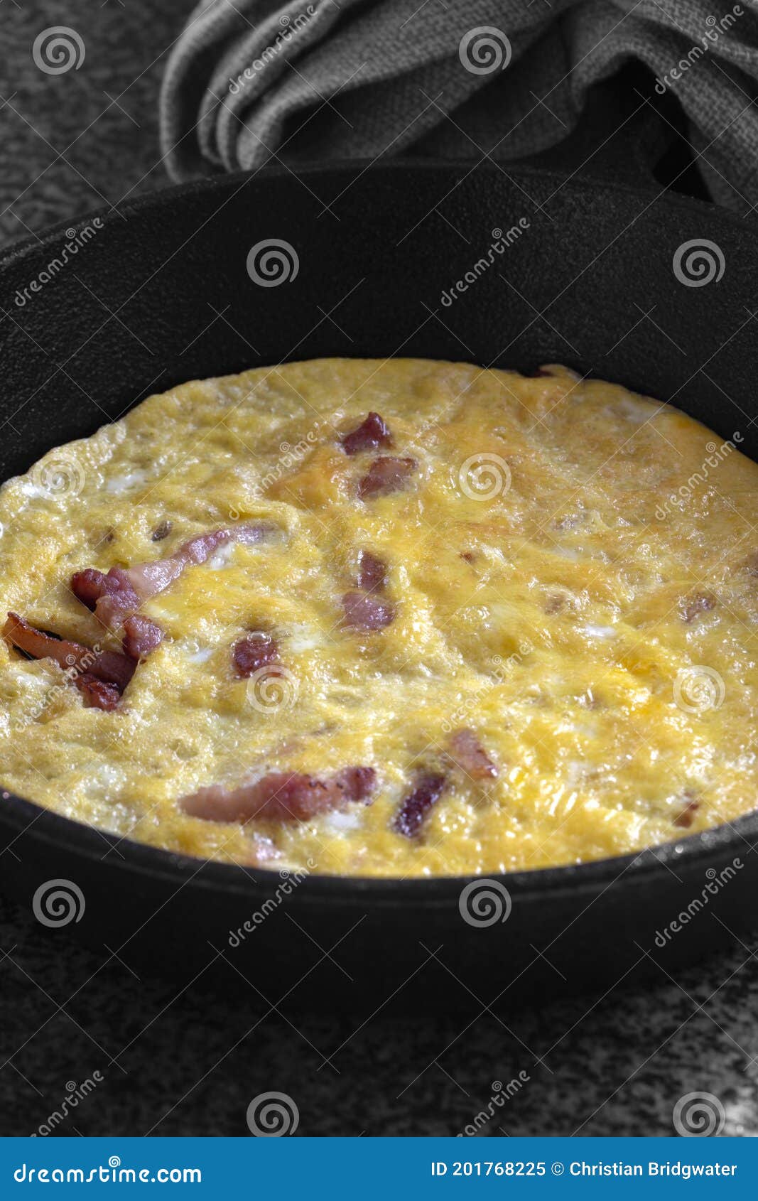 Omelette In Cast Iron Skillet On Wood Background RoyaltyFree Stock