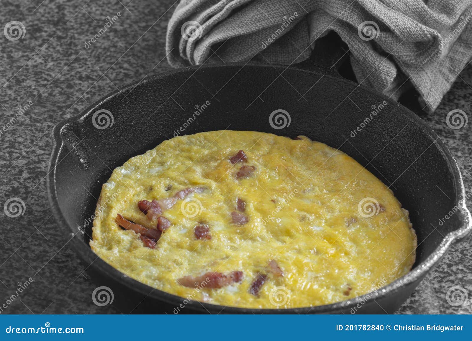 Omelette In Cast Iron Skillet On Wood Background RoyaltyFree Stock