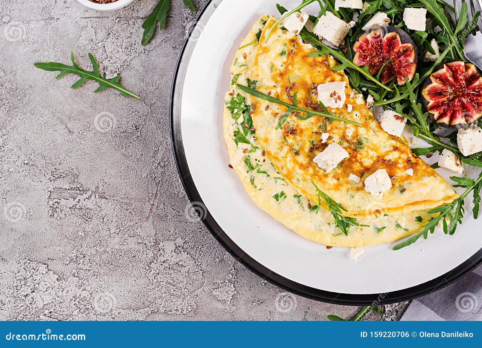 Omelette with Feta Cheese, Parsley and Salad with Figs, Arugula Stock ...