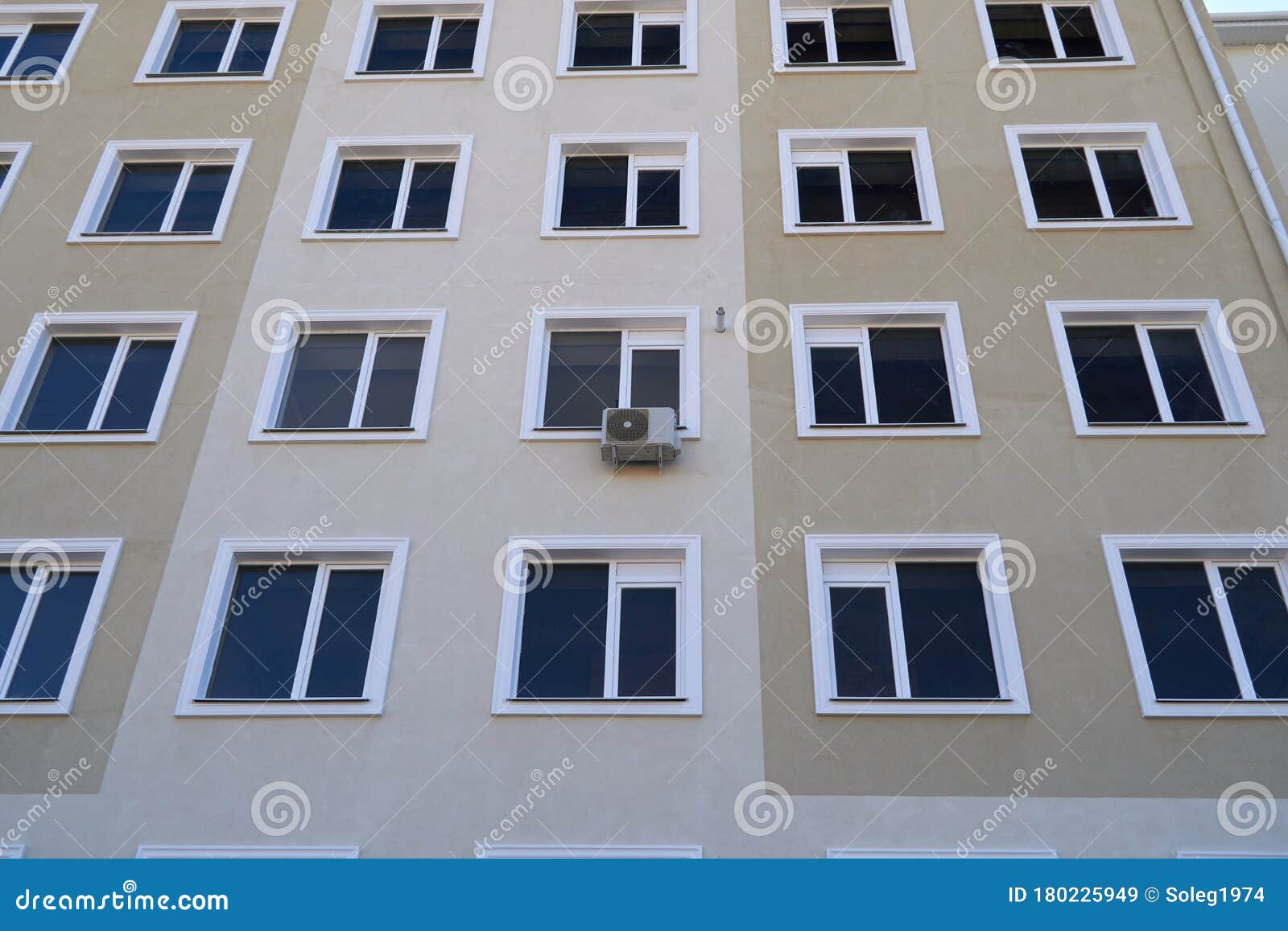 Air Conditioner. Air Conditioner Outside Of Building Above Street. Air