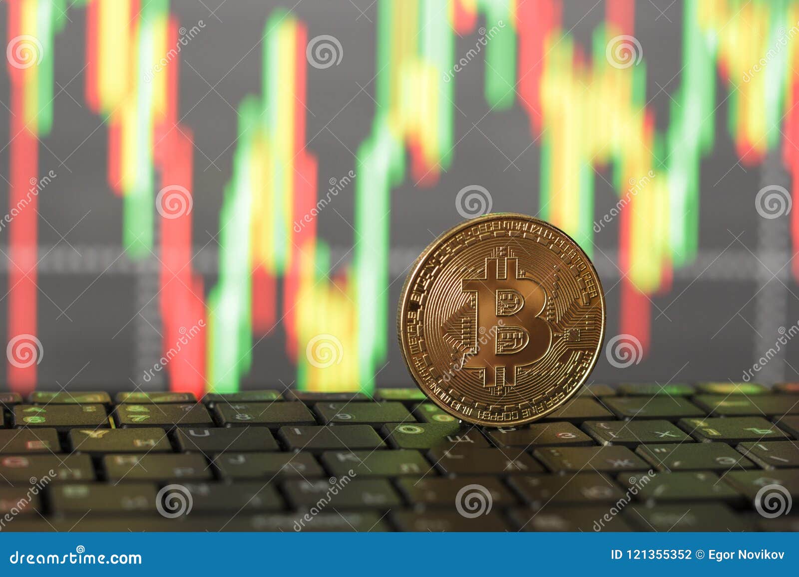 one bitcoin close-up on a blurry background