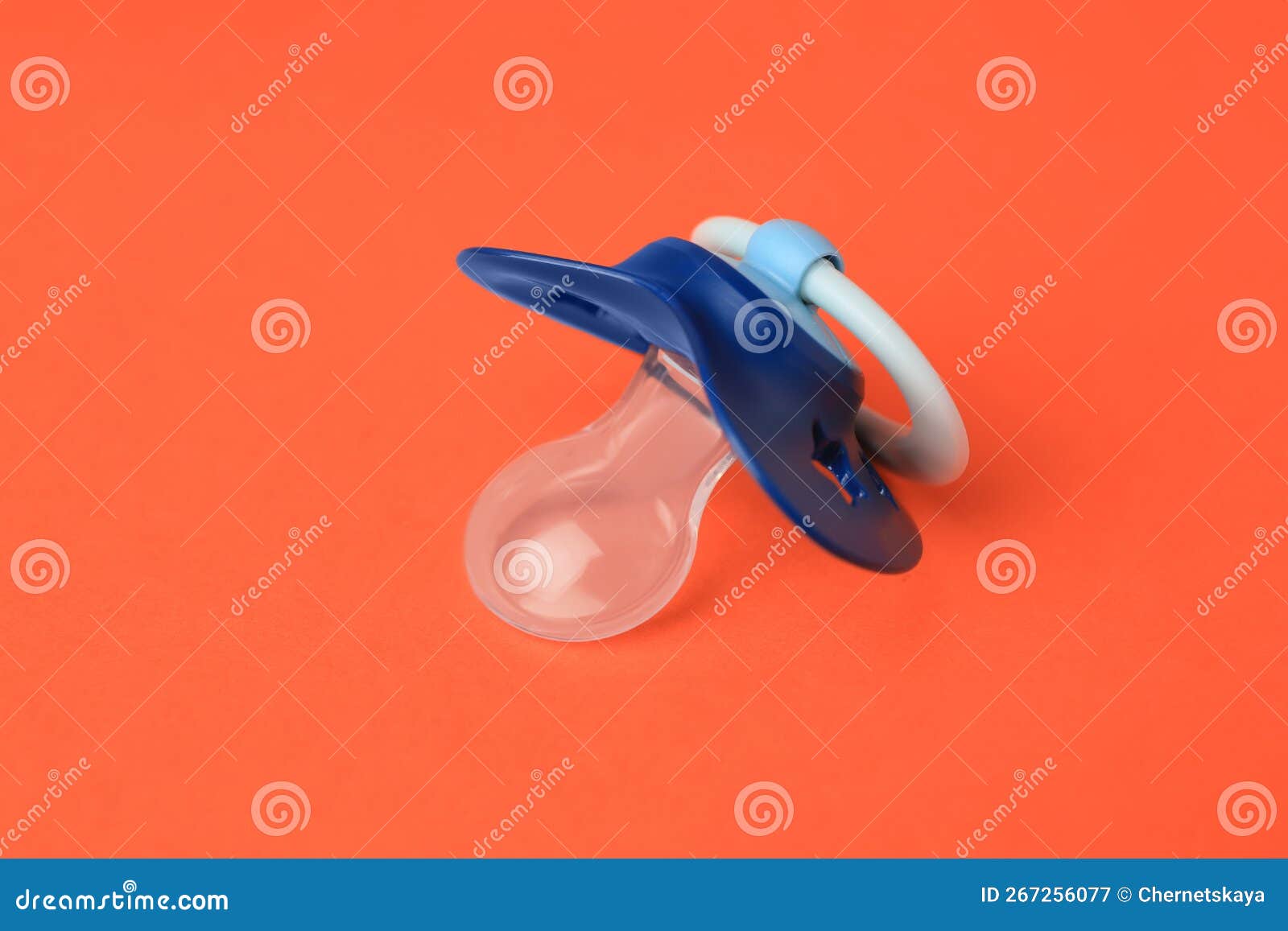 One Blue Baby Pacifier on Orange Background Stock Image Image of