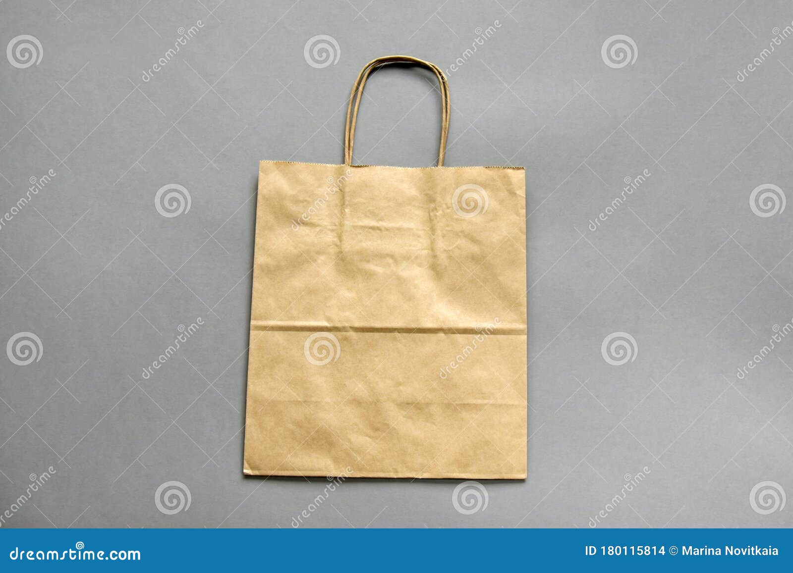 Download One Empty Brown Shopping Bag With Handles On Gray ...