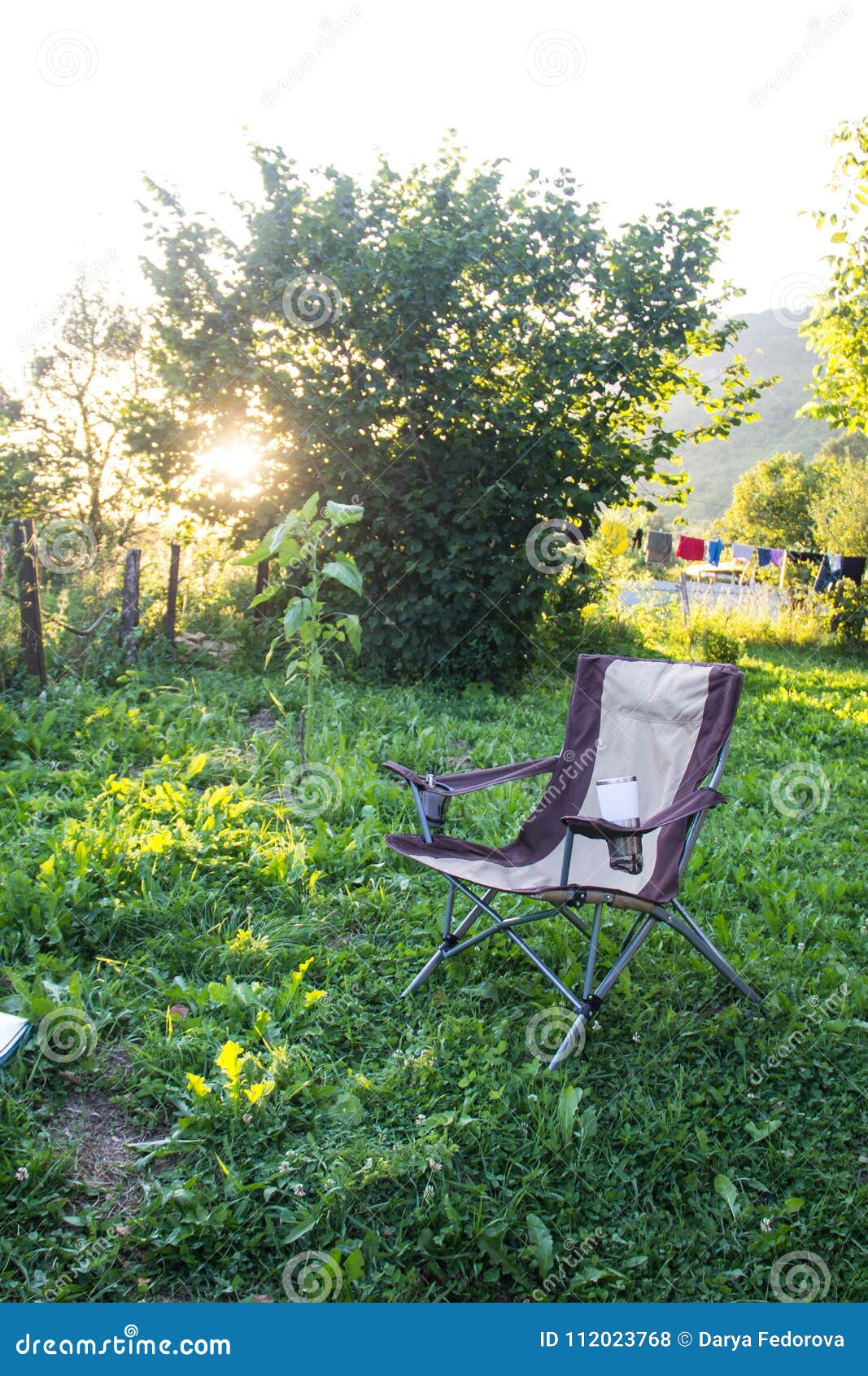 One Empty Folding Chair for Outdoor Camping in Nature Background on Sunset  Stock Photo - Image of isolated, sunset: 112023768