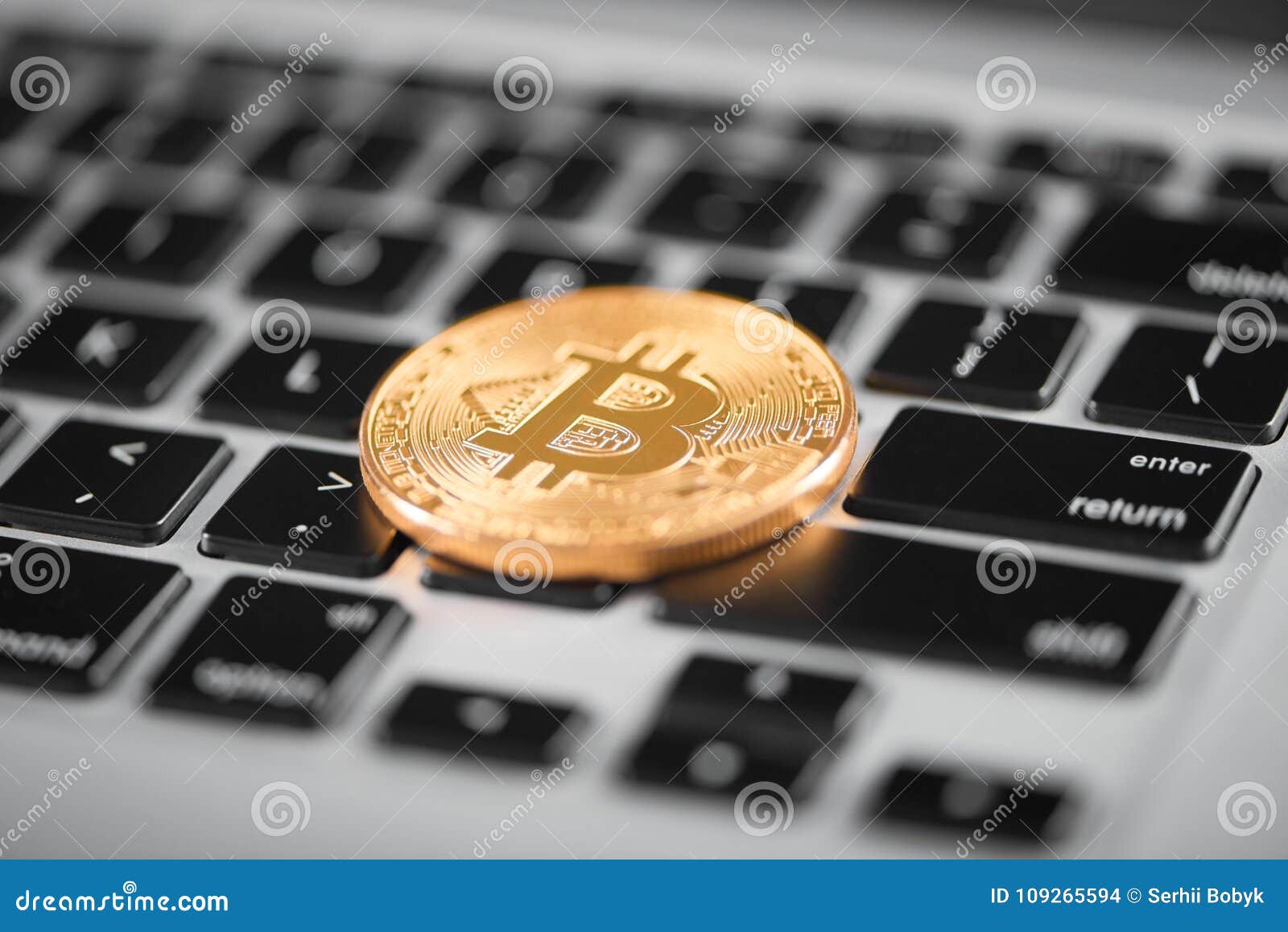 One Golden Bitcoin As World Main Cryptocurrency Placed On Laptop Keyboard Stock Photo - Image of ...