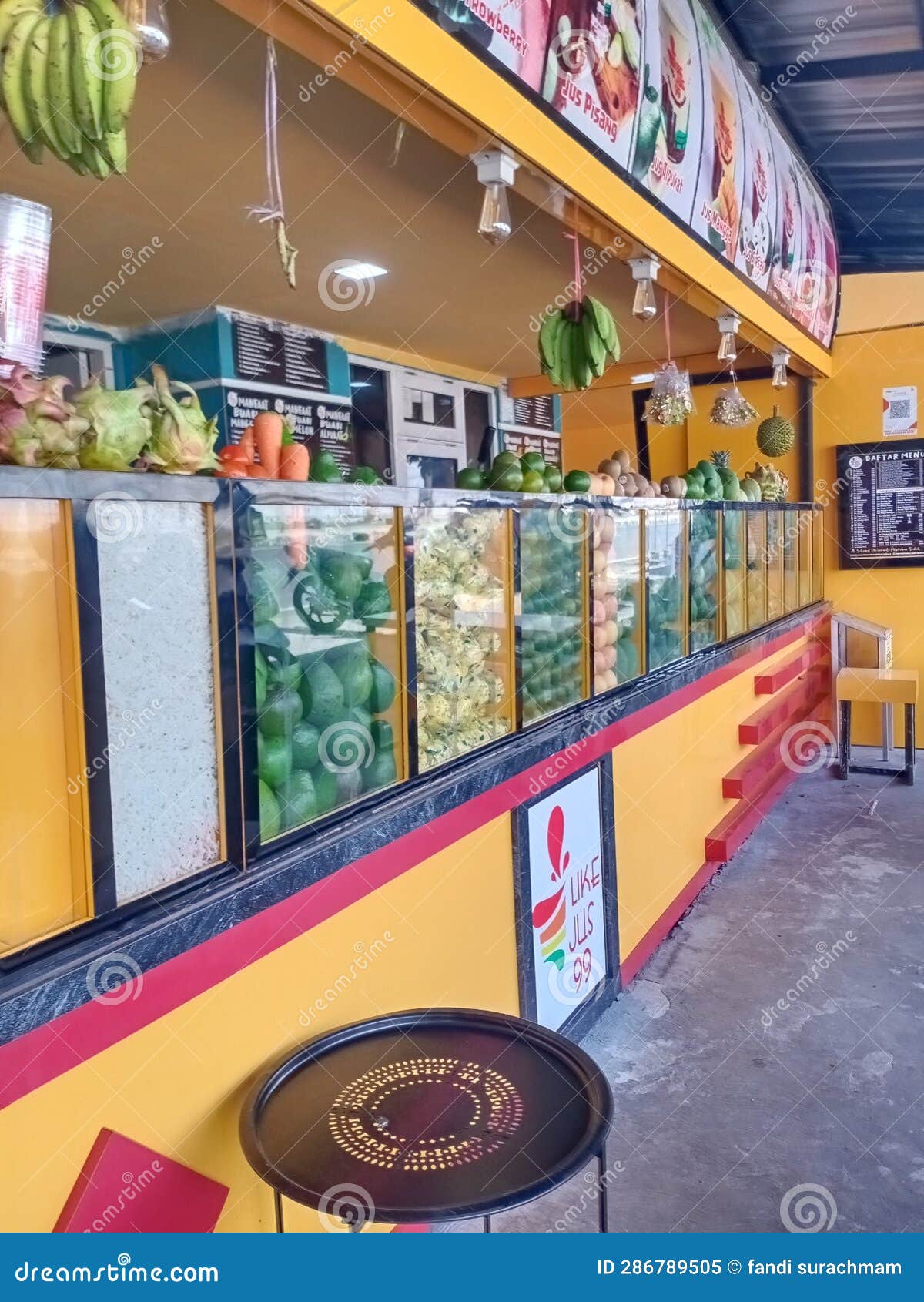 One Hot Day at the Fruit Juice Shop on the Side of the Road?? Editorial