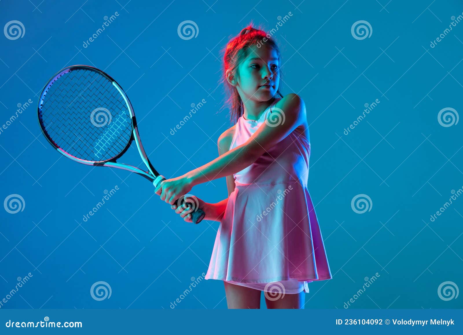 One Little Girl, Beginner Tennis Player Posing Isolated on Blue Studio  Background in Neon Light. Sport, Study, Childhood Stock Photo - Image of  active, background: 236104092
