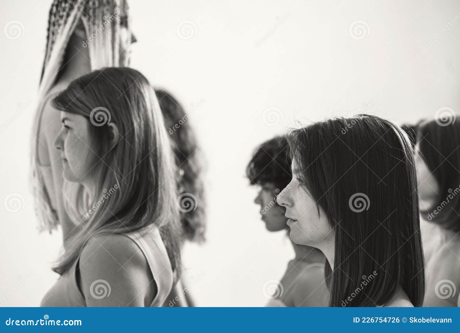 One Woman Against a Big Crowd. the Girl Doubts the Activities of the  Majority. a Lot of Girls in Beige Underwear. a Lot Stock Photo - Image of  poster, performance: 226754726