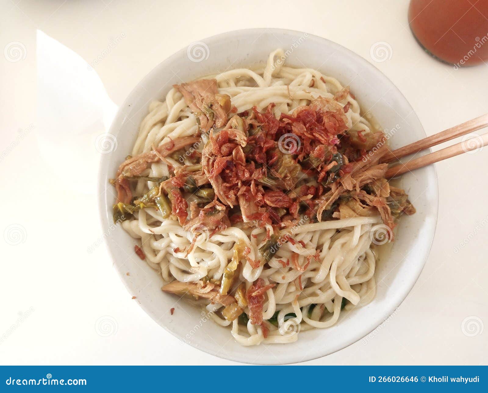 One Portion of Noodles with Chicken Topping in a Bowl. Stock Photo