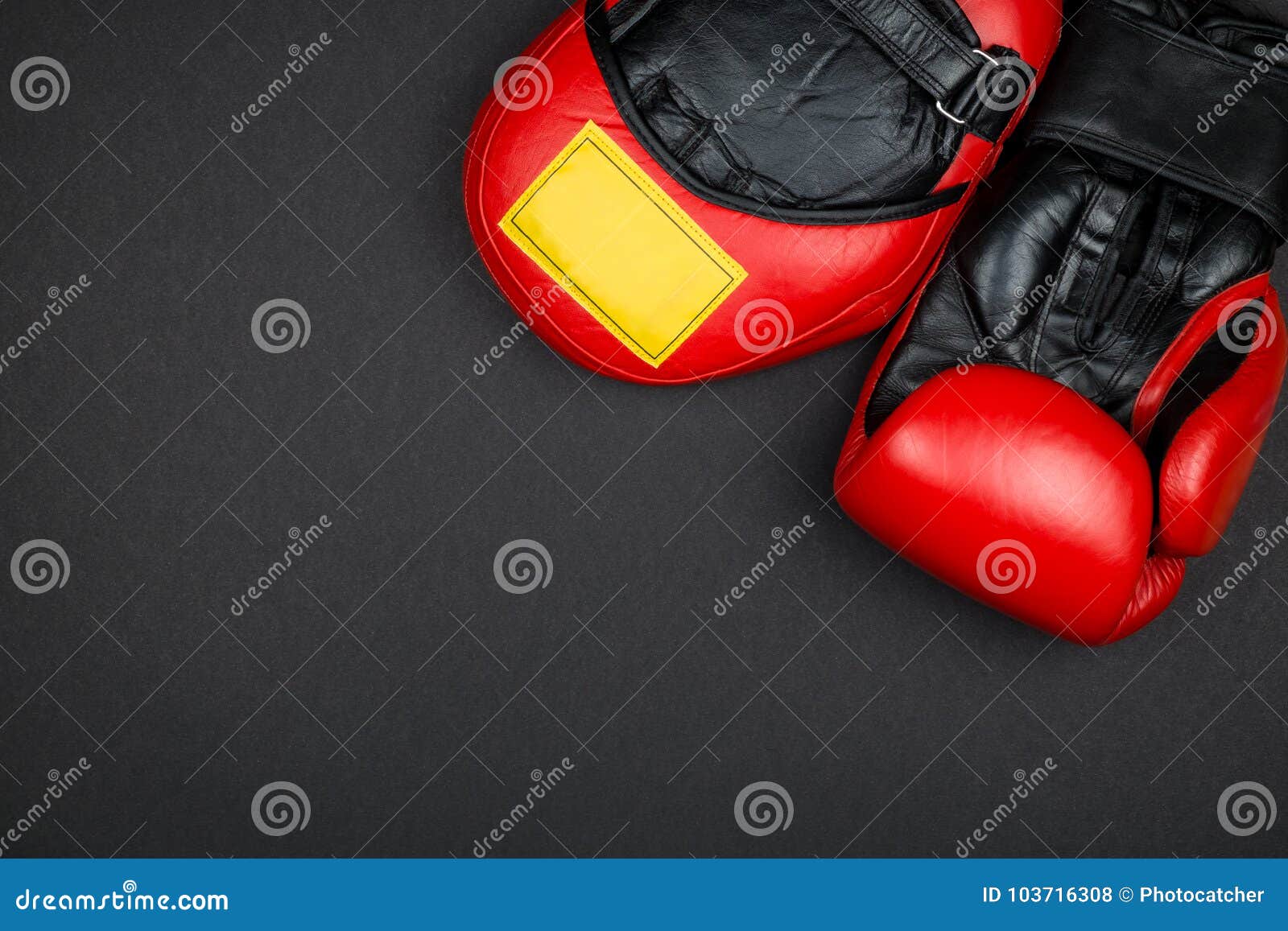 https://thumbs.dreamstime.com/z/one-red-leather-boxing-glove-hook-pad-black-surface-red-boxing-equipment-103716308.jpg