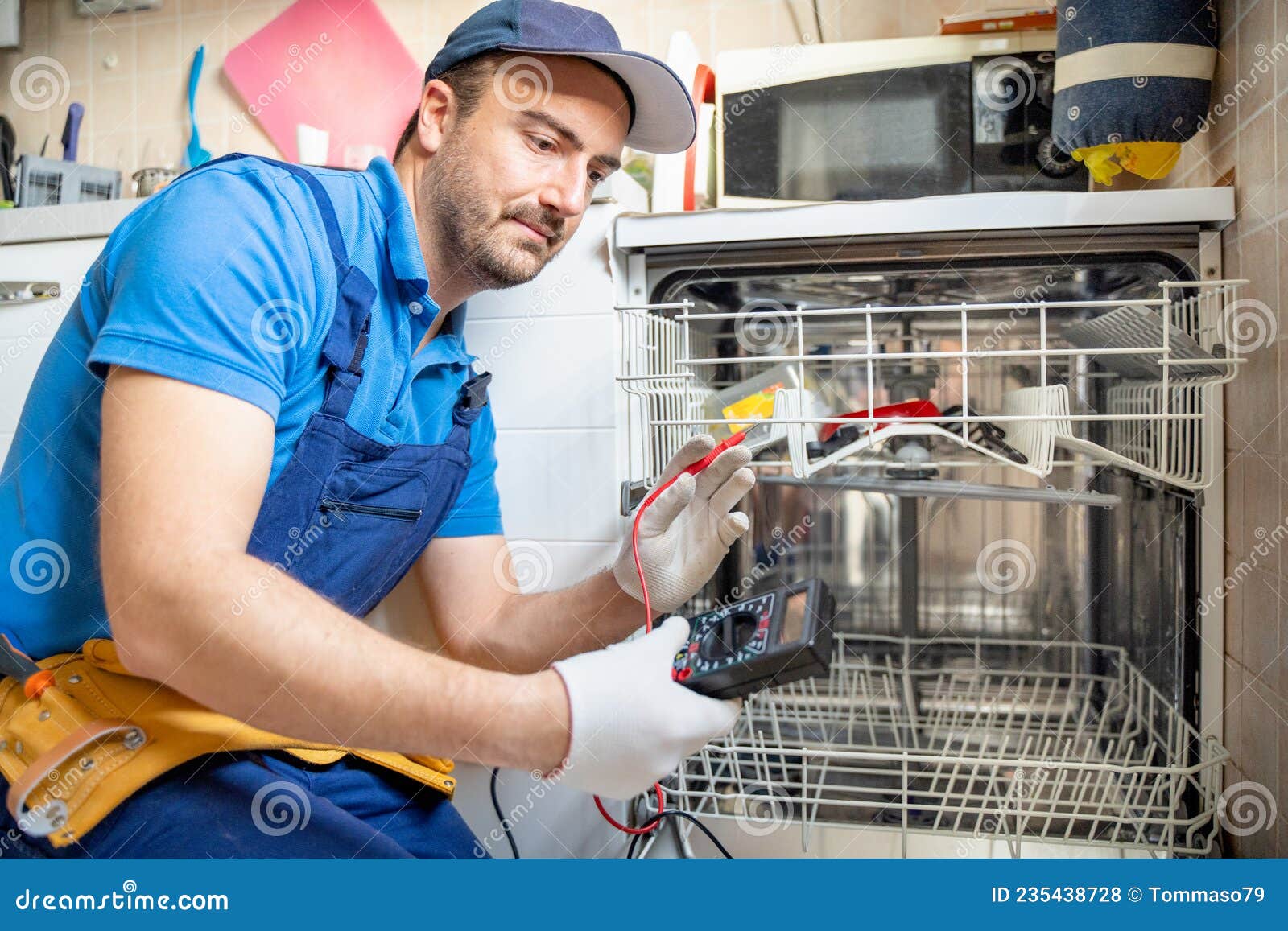 One Repairman Fixing Malfunctioning Kitchen Dishwasher Problem Stock