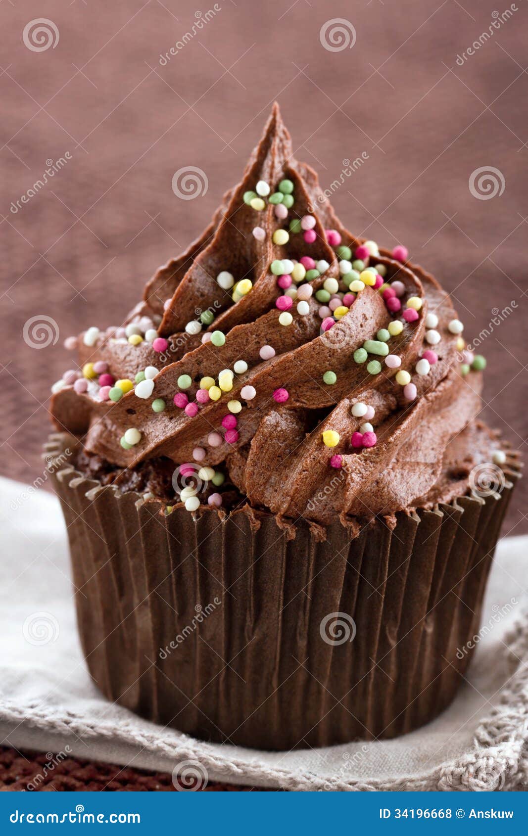 One Single Chocolate Cupcake With Sprinkles Royalty Free One Single Chocolate Cupcake With Sprinkles Royalty Free