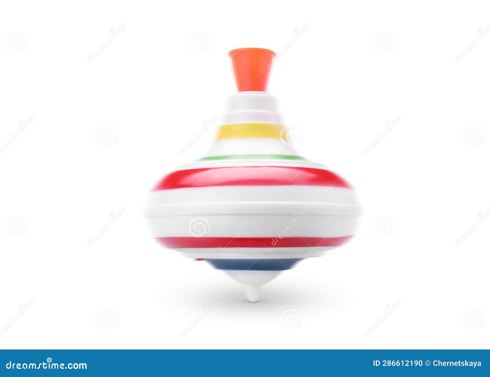 One Spinning Top in Motion on White Background. Toy Whirligig Stock