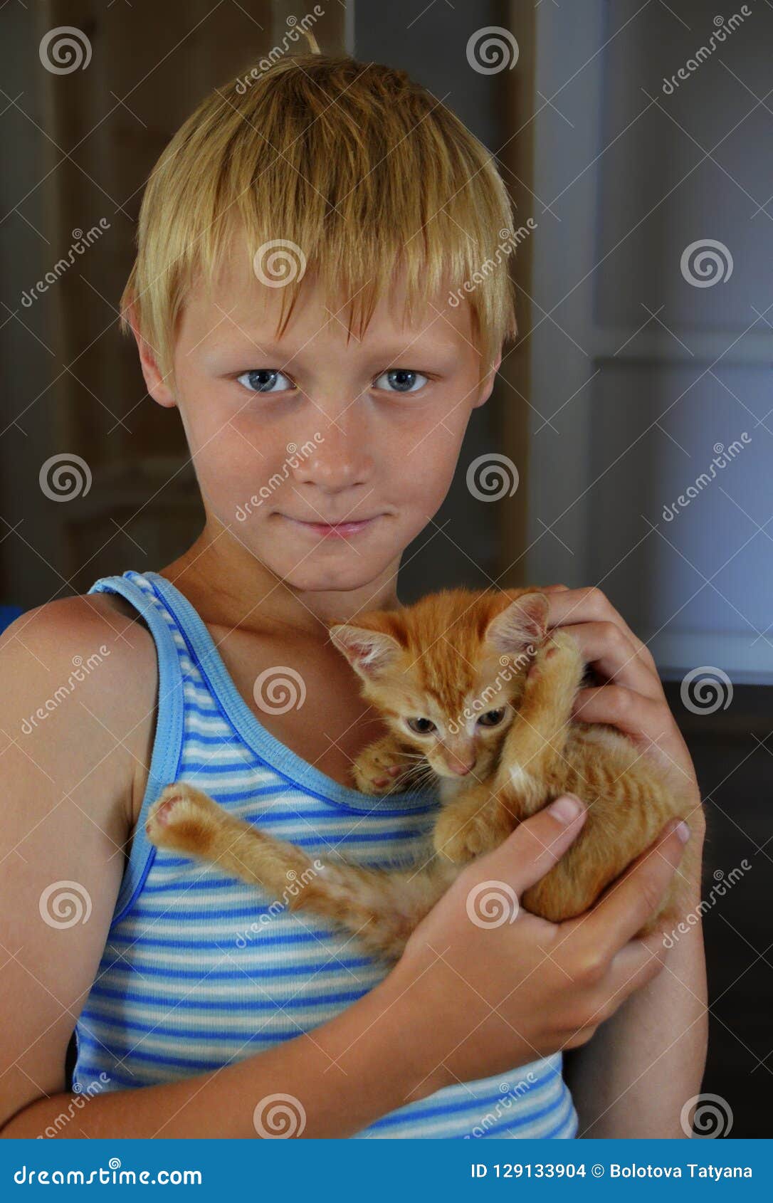 One Teenager Boy In A Blue Striped T-Shirt With White Short Hair Stock  Photo - Image Of Dark, Holds: 129133904