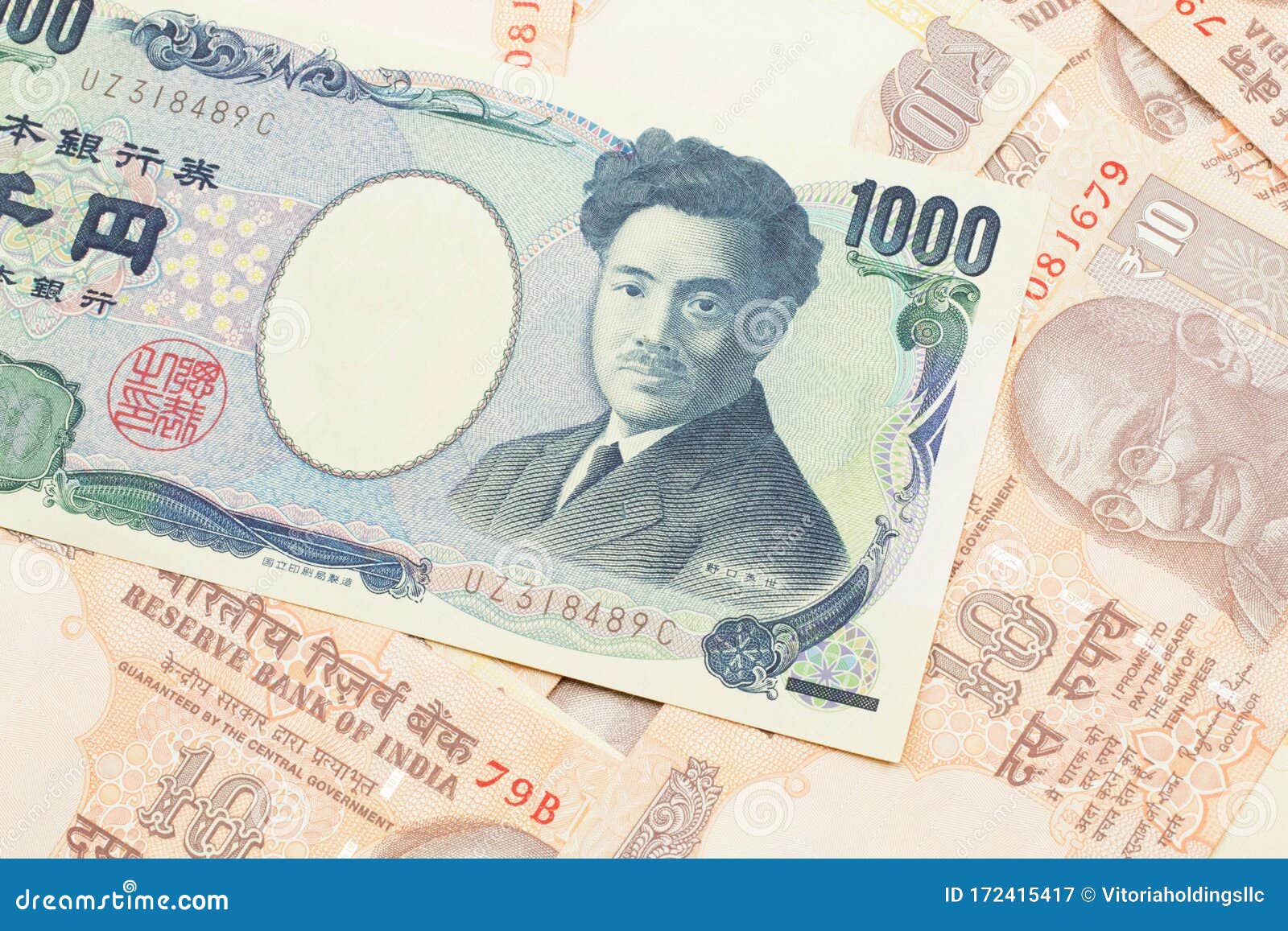 A Japanese Yen Bank Note With Indian Ten Rupee Bank Notes Stock Image - Image of bank, bills ...