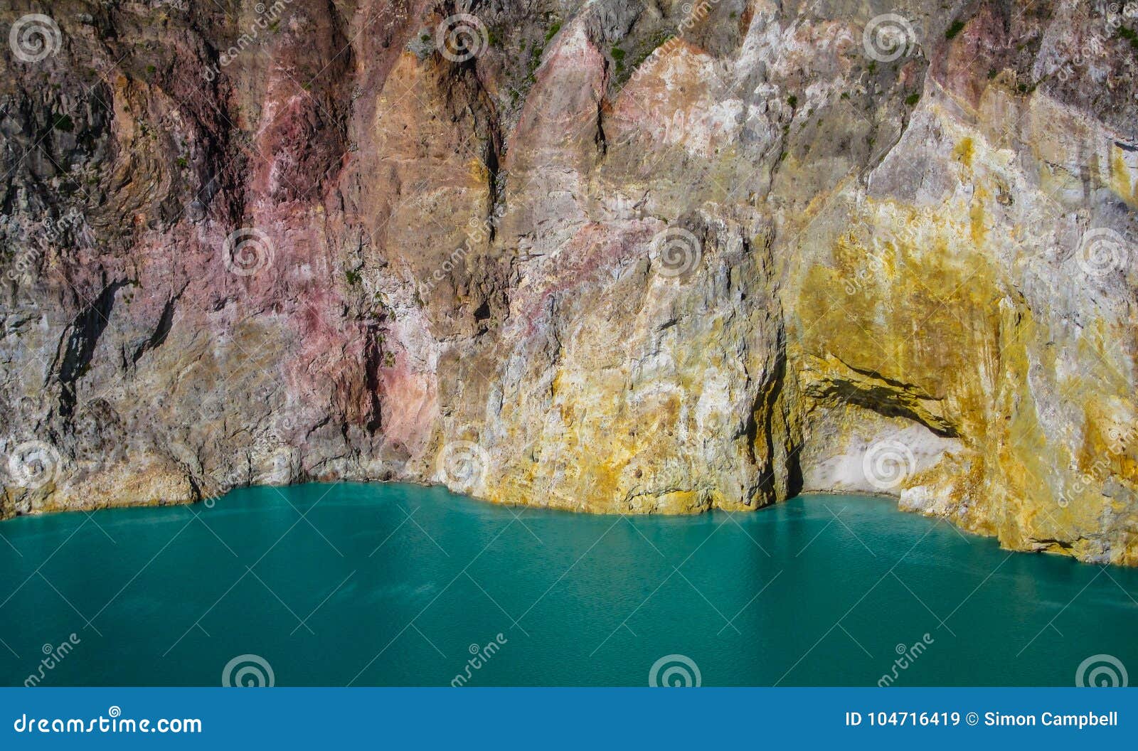 mt kelimutu`s volcanic lakes and colored rock faces. flores, indonesia