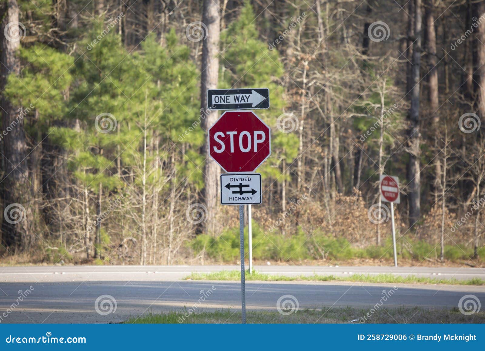 One Way, Stop, and Divided Highway Signs Editorial Photo Image of