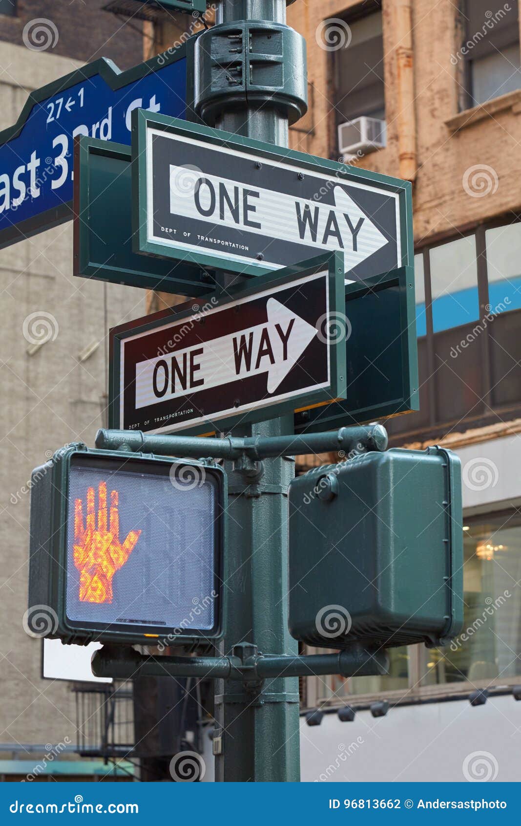 One Way Street Sign Pole In New York With Red Traffic Light Editorial ... One Way Street Signs