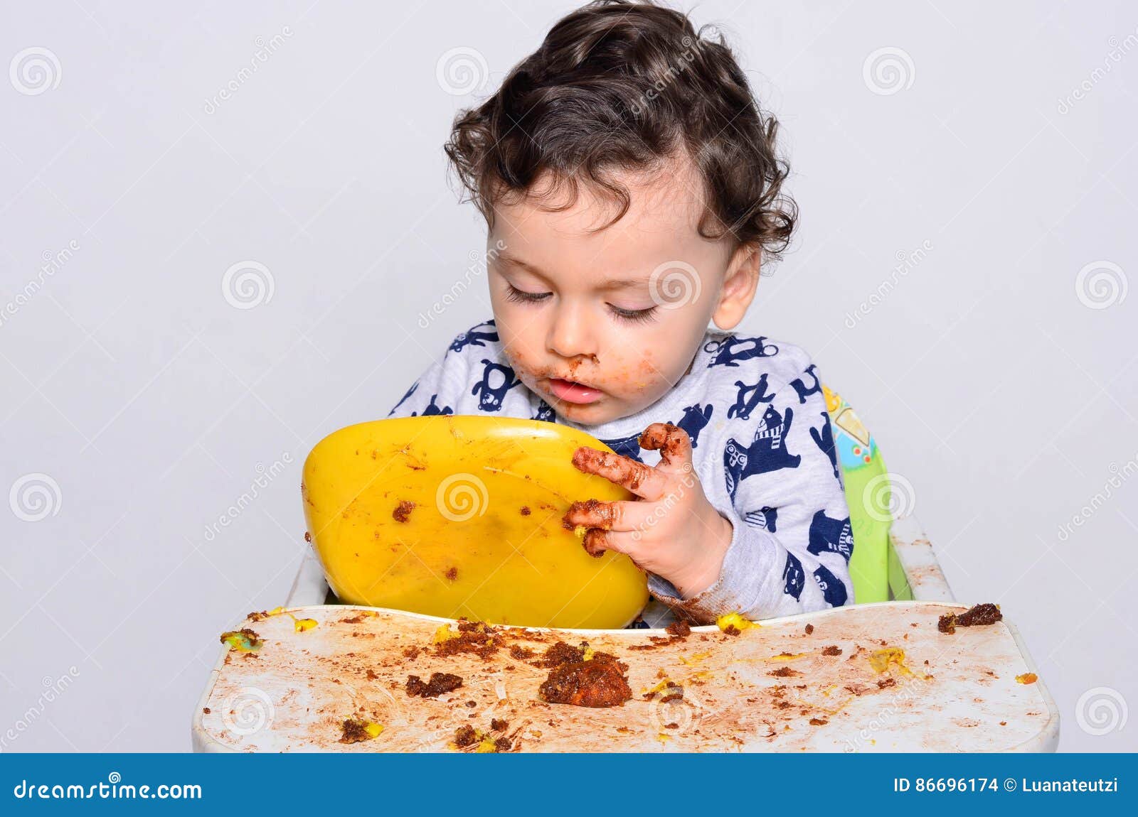 One Year Old Kid Eating a Slice of Birthday Smash Cake by Himself ...