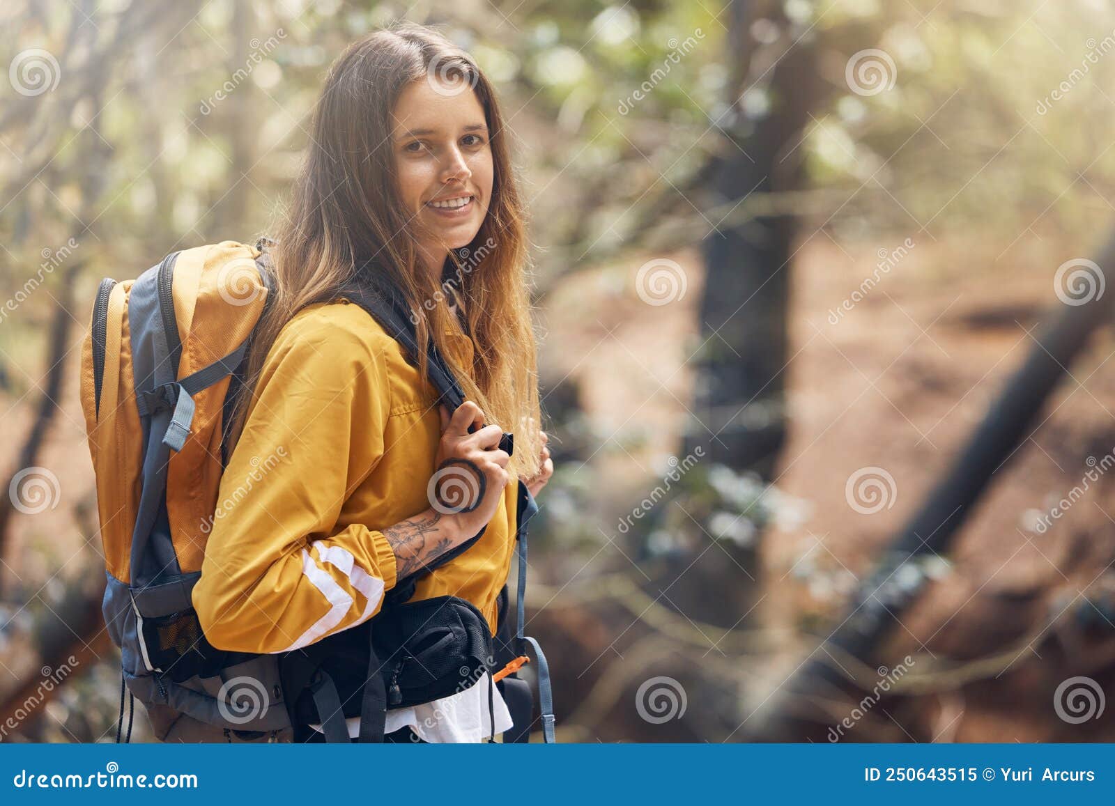 One Young Active Caucasian Woman Wearing a Backpack while Out Hiking in ...