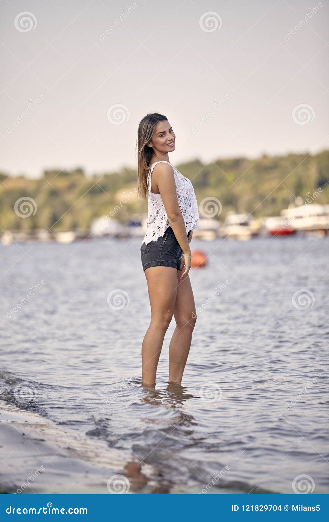 Young casual fashion beautiful girl standing in studio Stock Photo