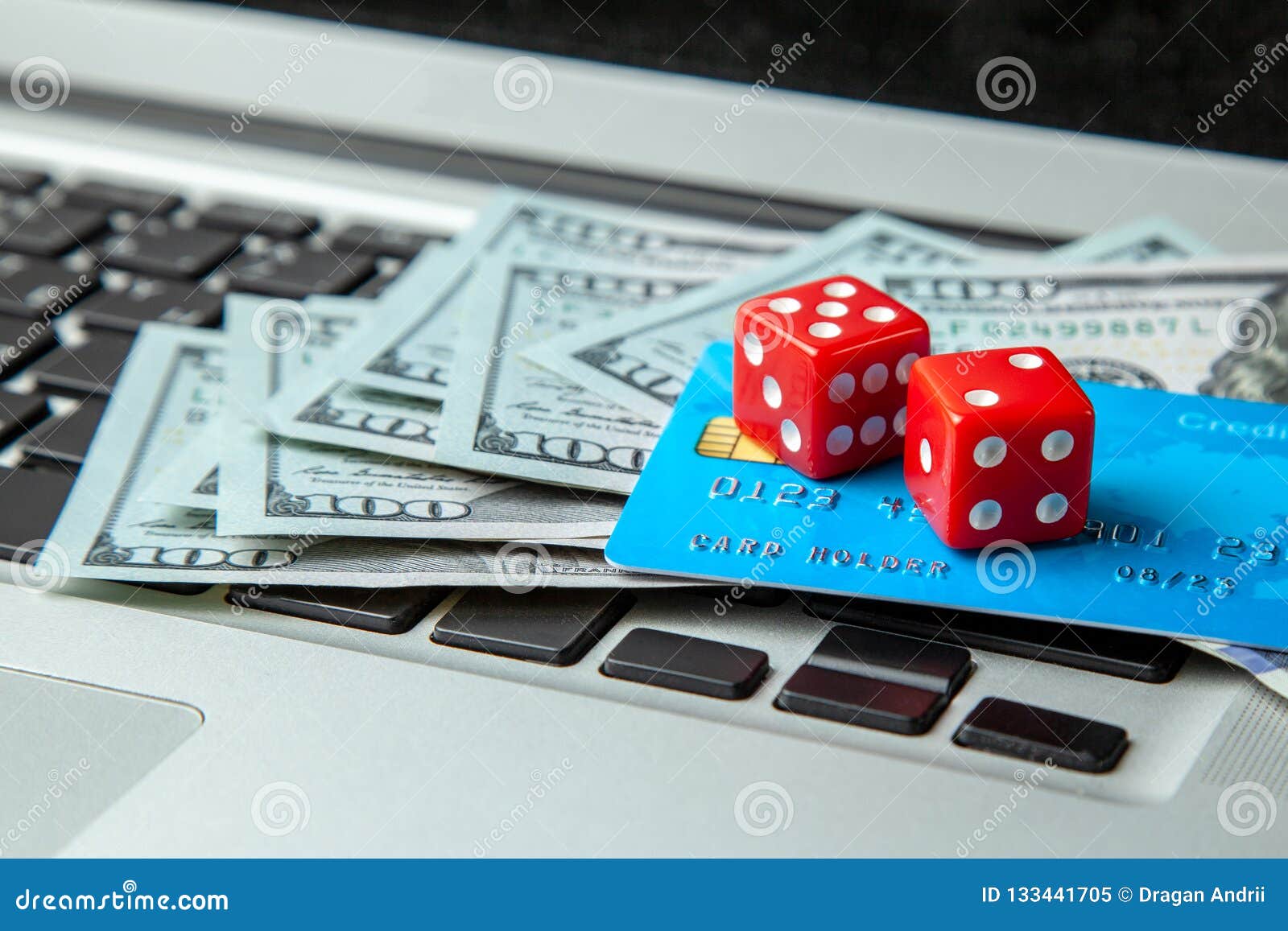 Online Casino, Online Gambling. Money Cash Dollars and Credit Brief with  Dice for Gaming on Laptop Keyboard. Stock Image - Image of addiction,  business: 133441705